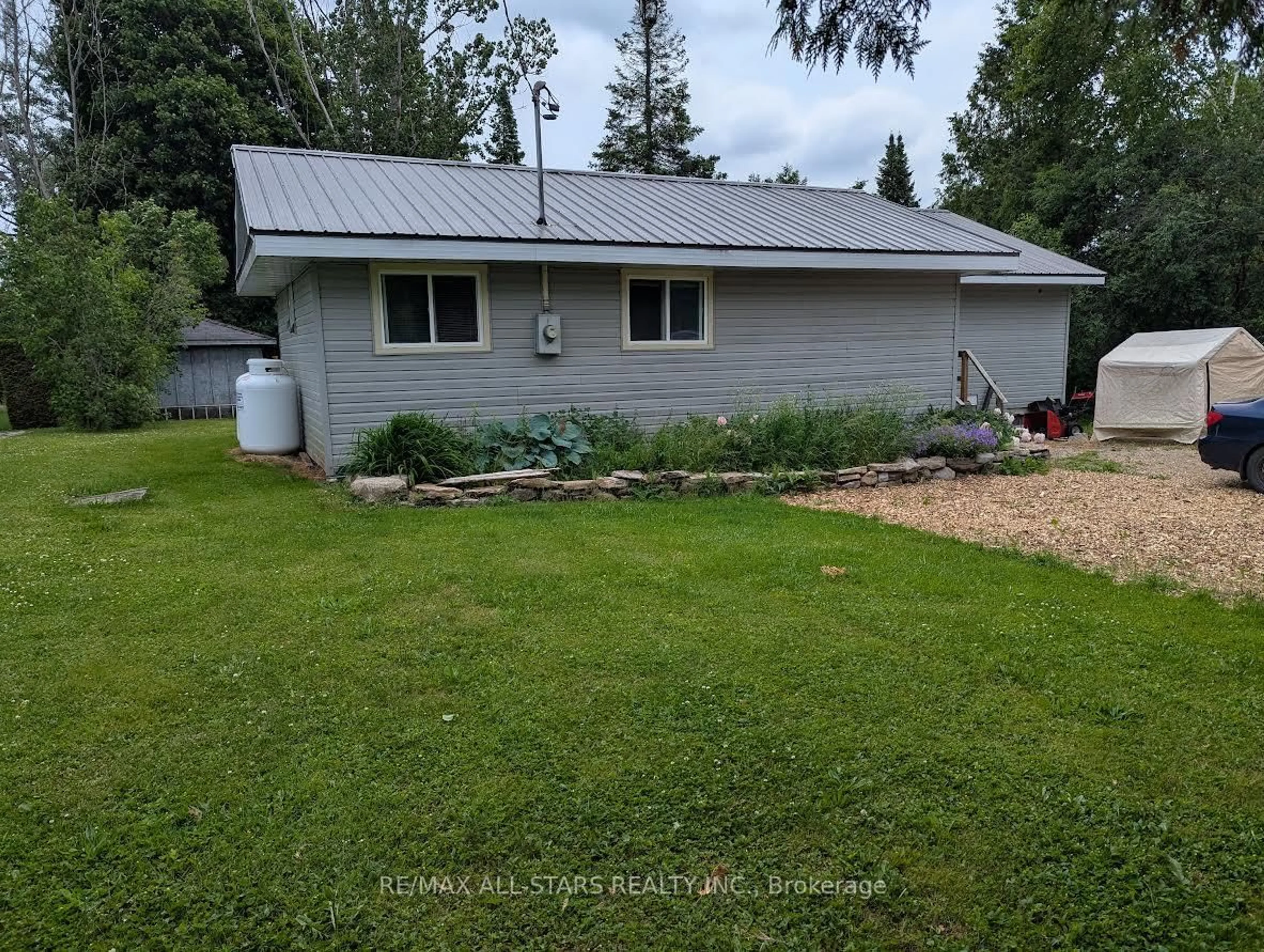 A pic from outside/outdoor area/front of a property/back of a property/a pic from drone, unknown for 234 Crosby Dr, Kawartha Lakes Ontario K0M 1A0