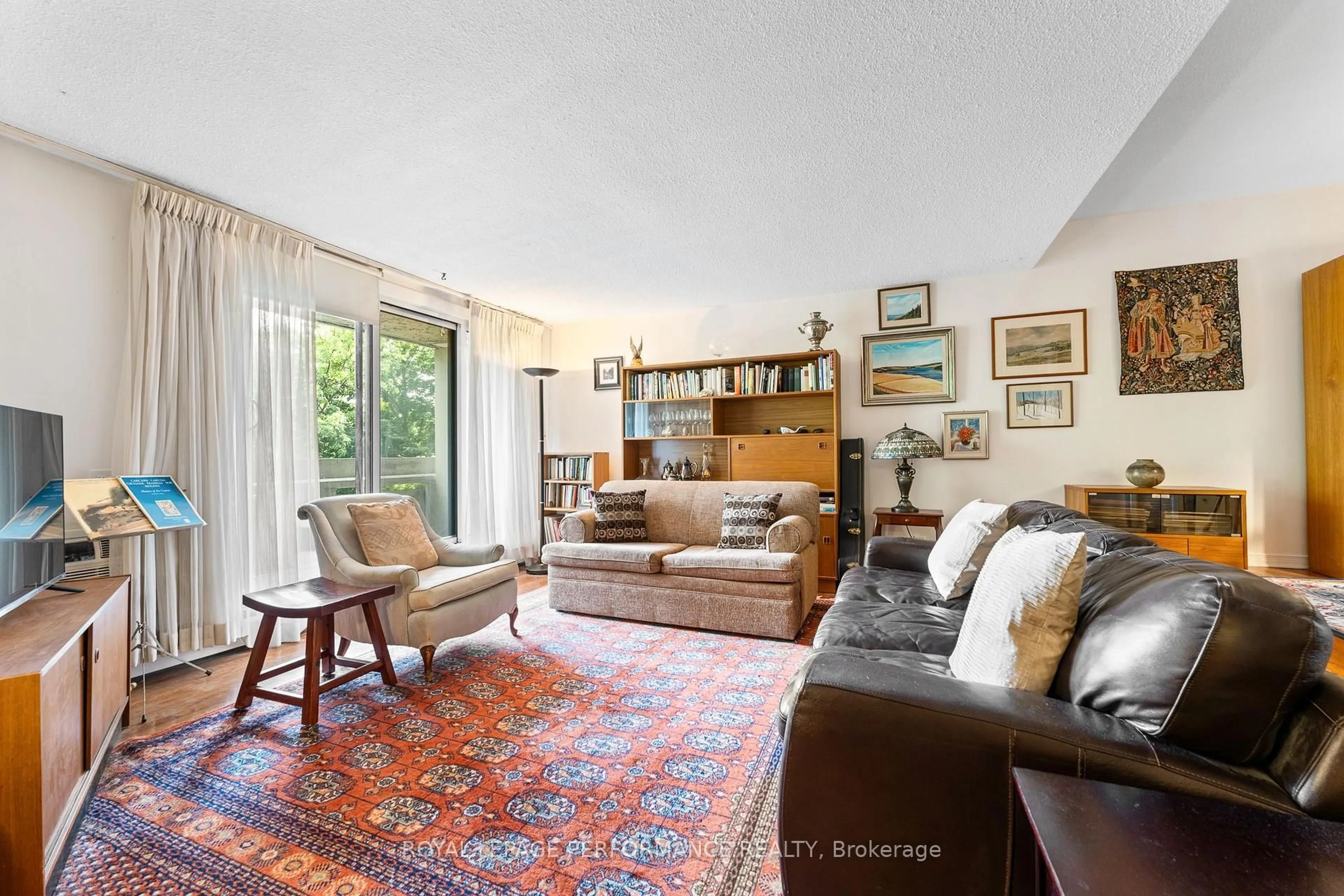 Living room with furniture, unknown for 1171 Ambleside Dr #304, Ottawa Ontario K2B 8E1