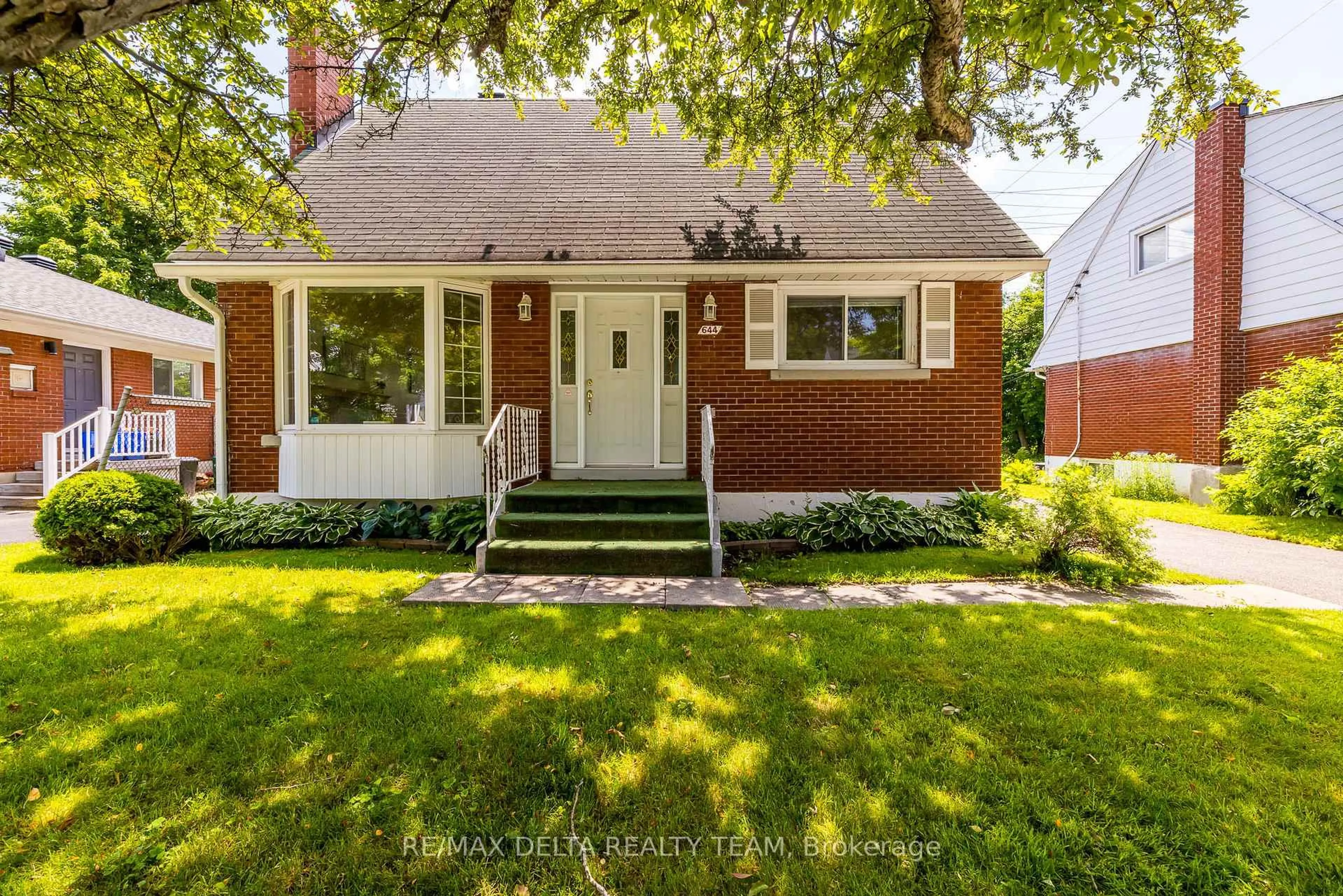 Home with brick exterior material, street for 644 Browning Ave, Ottawa Ontario K1G 0T9
