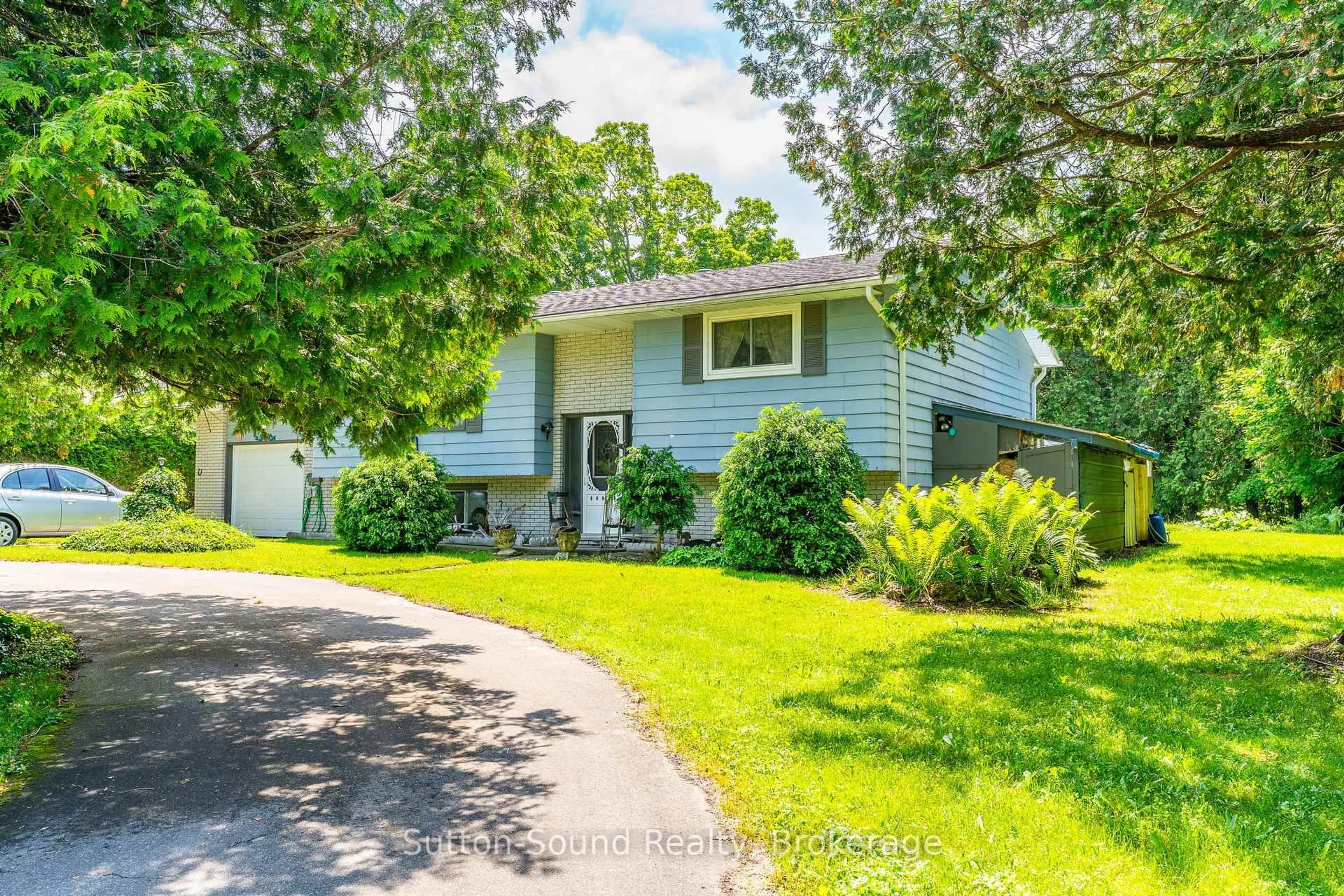 Home with vinyl exterior material, street for 17 Front St, South Bruce Peninsula Ontario N0H 1P0