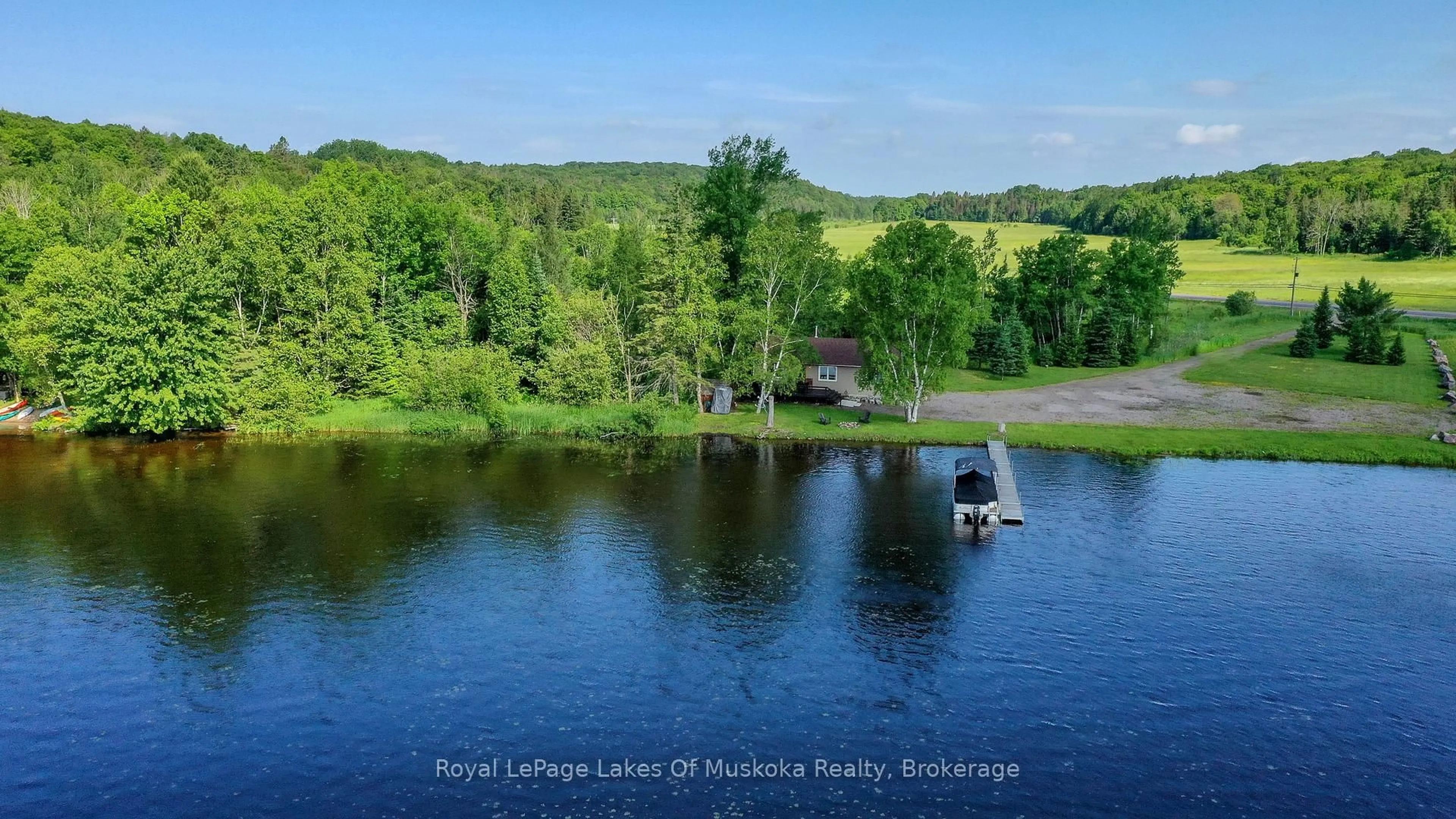 A pic from outside/outdoor area/front of a property/back of a property/a pic from drone, water/lake/river/ocean view for 3105 520 Highway, Magnetawan Ontario P0A 1P0