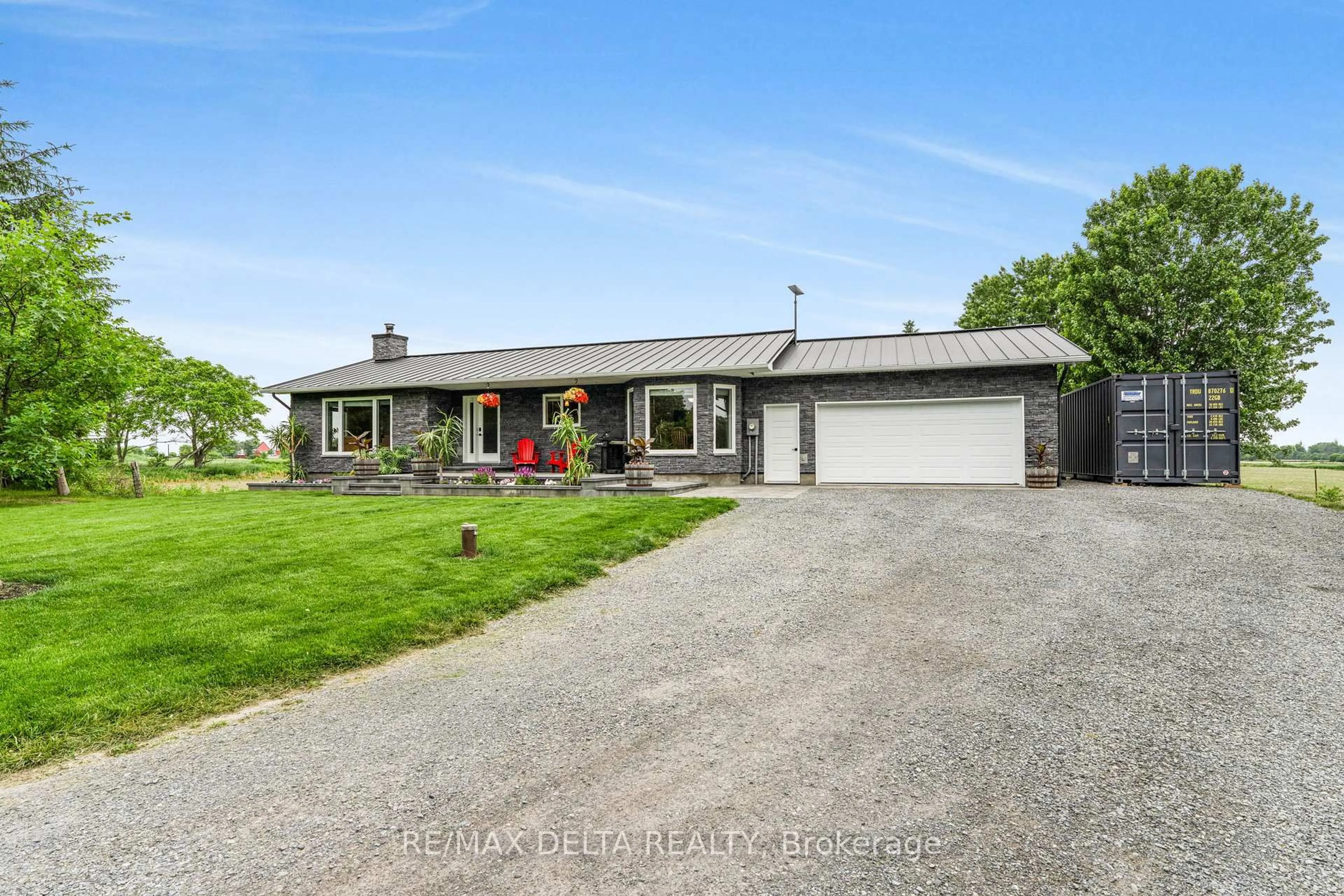 A pic from outside/outdoor area/front of a property/back of a property/a pic from drone, street for 12271 County Rd 5 Rd, North Dundas Ontario K0C 2H0