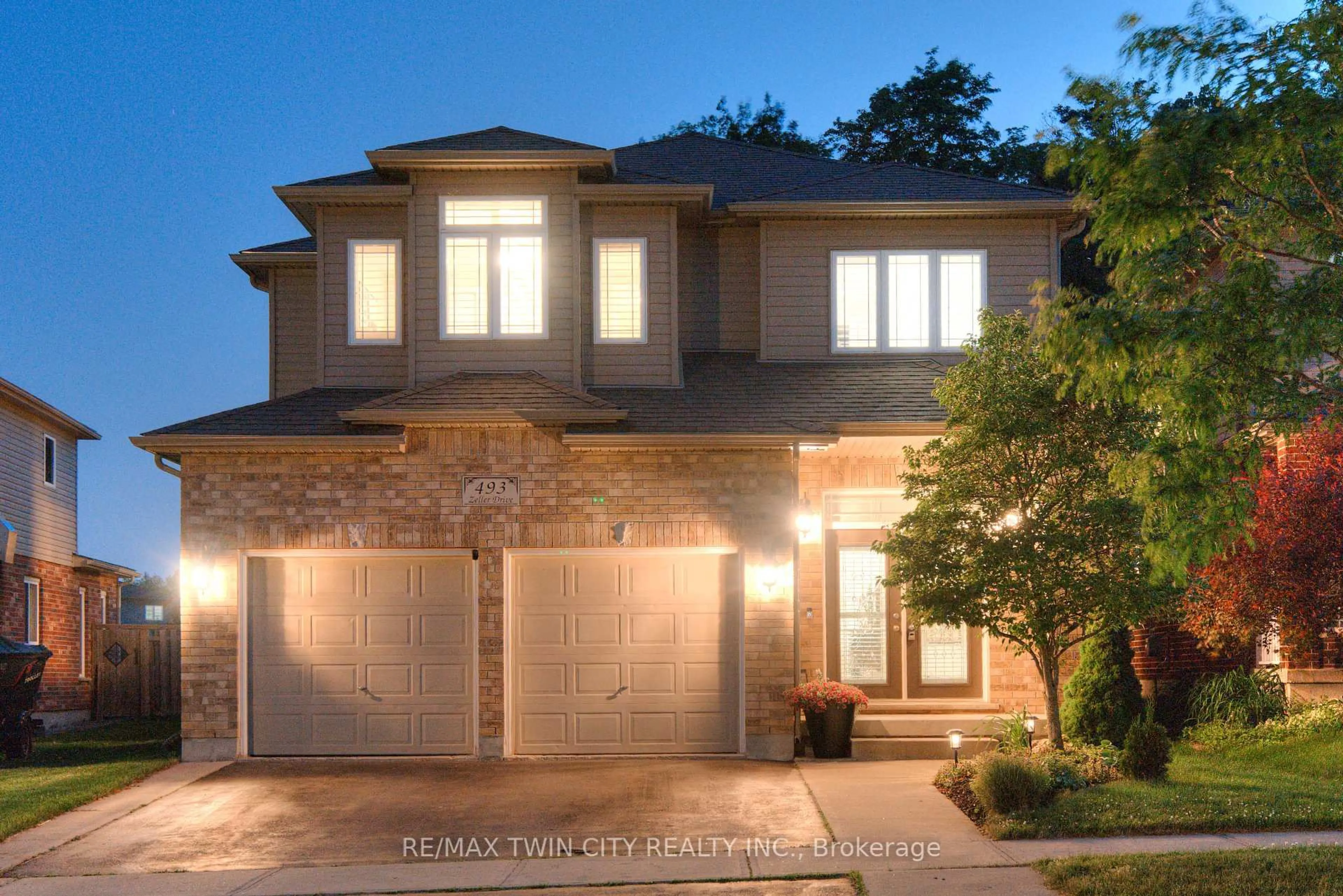 Home with brick exterior material, street for 493 Zeller Dr, Kitchener Ontario N2A 4M4