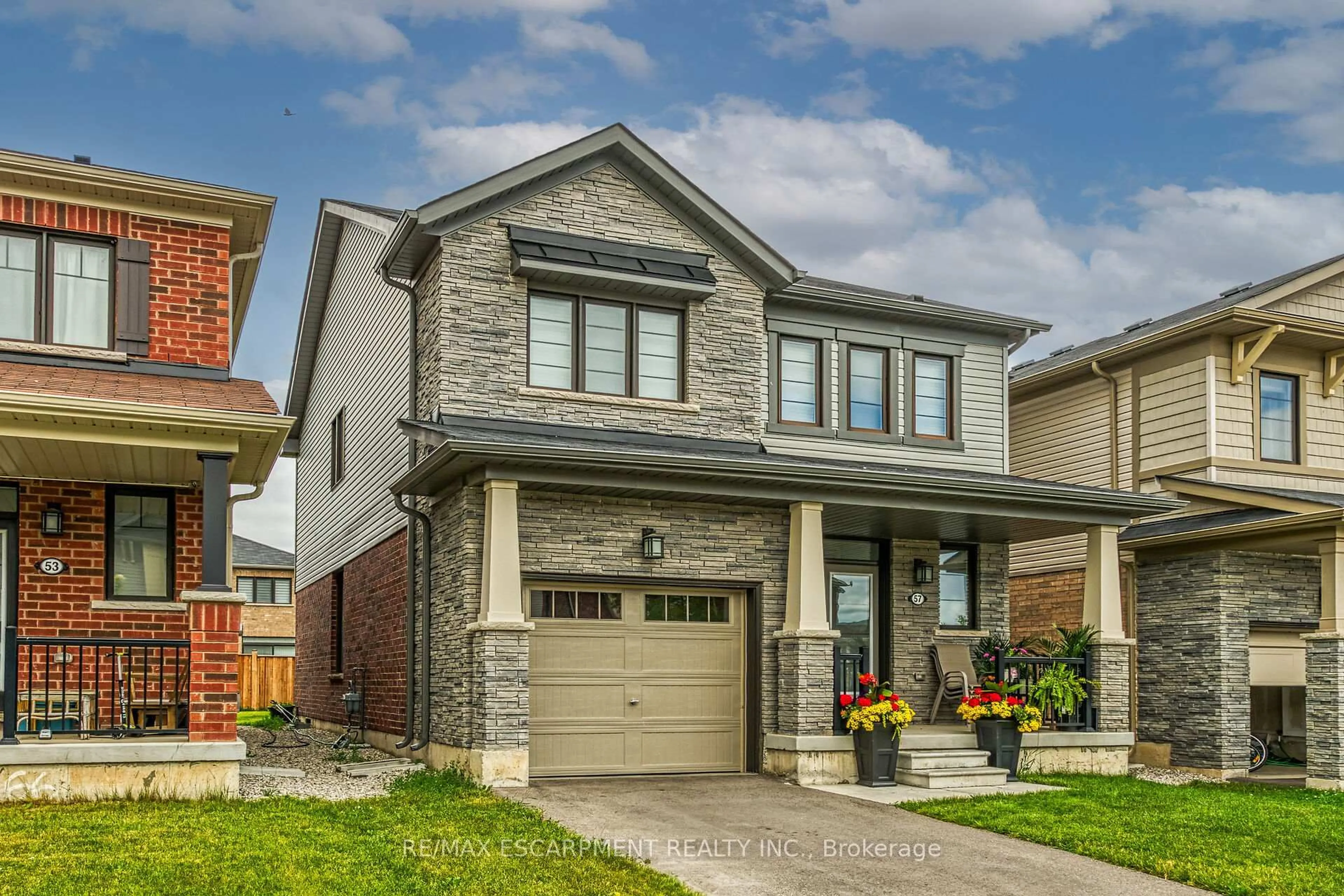 Home with brick exterior material, street for 57 Queen Mary Blvd, Hamilton Ontario L8J 0M4