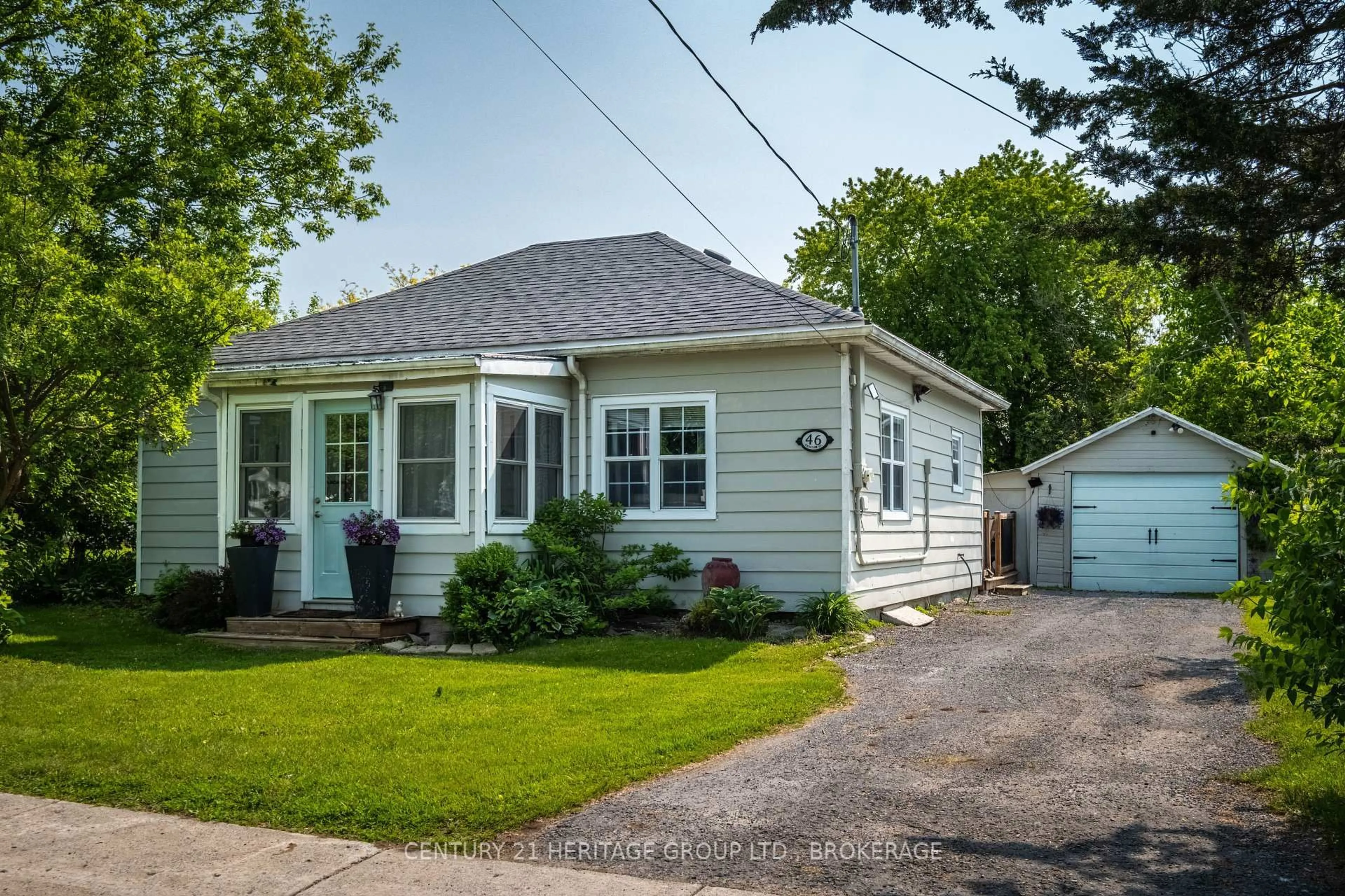 Home with vinyl exterior material, street for 46 Centre St, Bissett Creek Ontario K0H 2H0