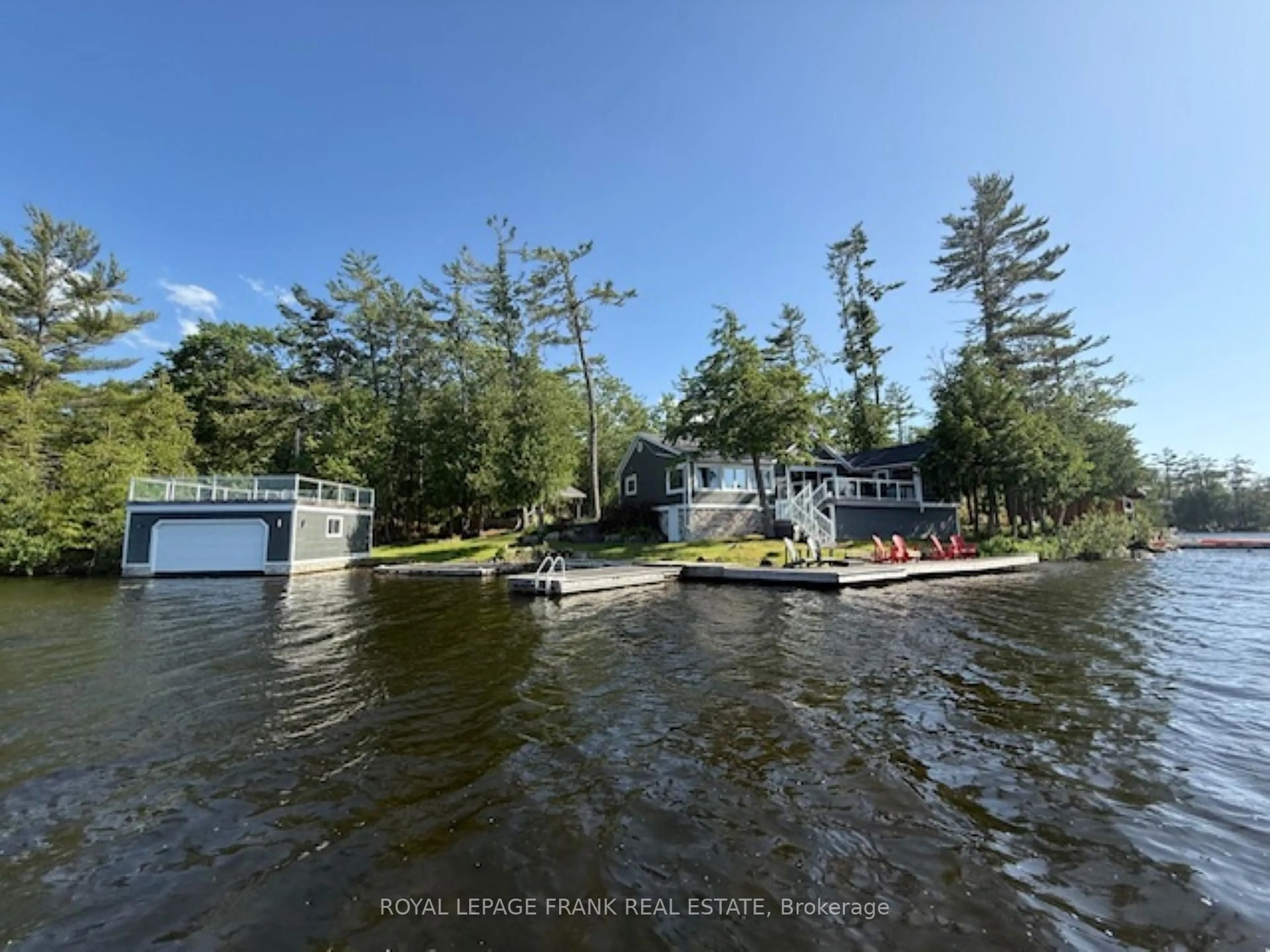 A pic from outside/outdoor area/front of a property/back of a property/a pic from drone, water/lake/river/ocean view for 1786 South Bayshore Rd, Douro-Dummer Ontario K0L 2H0