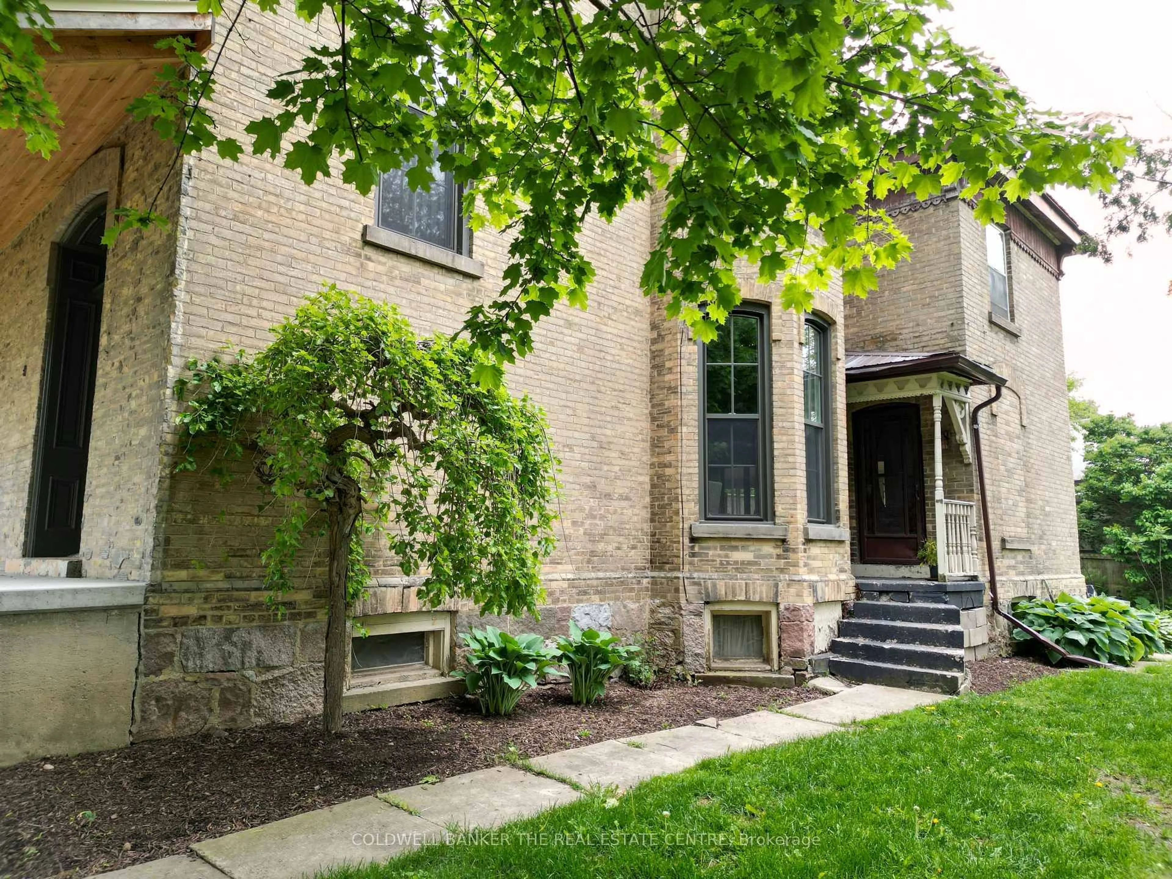Home with brick exterior material, street for 150 WELLINGTON St, Wellington North Ontario N0G 2L2