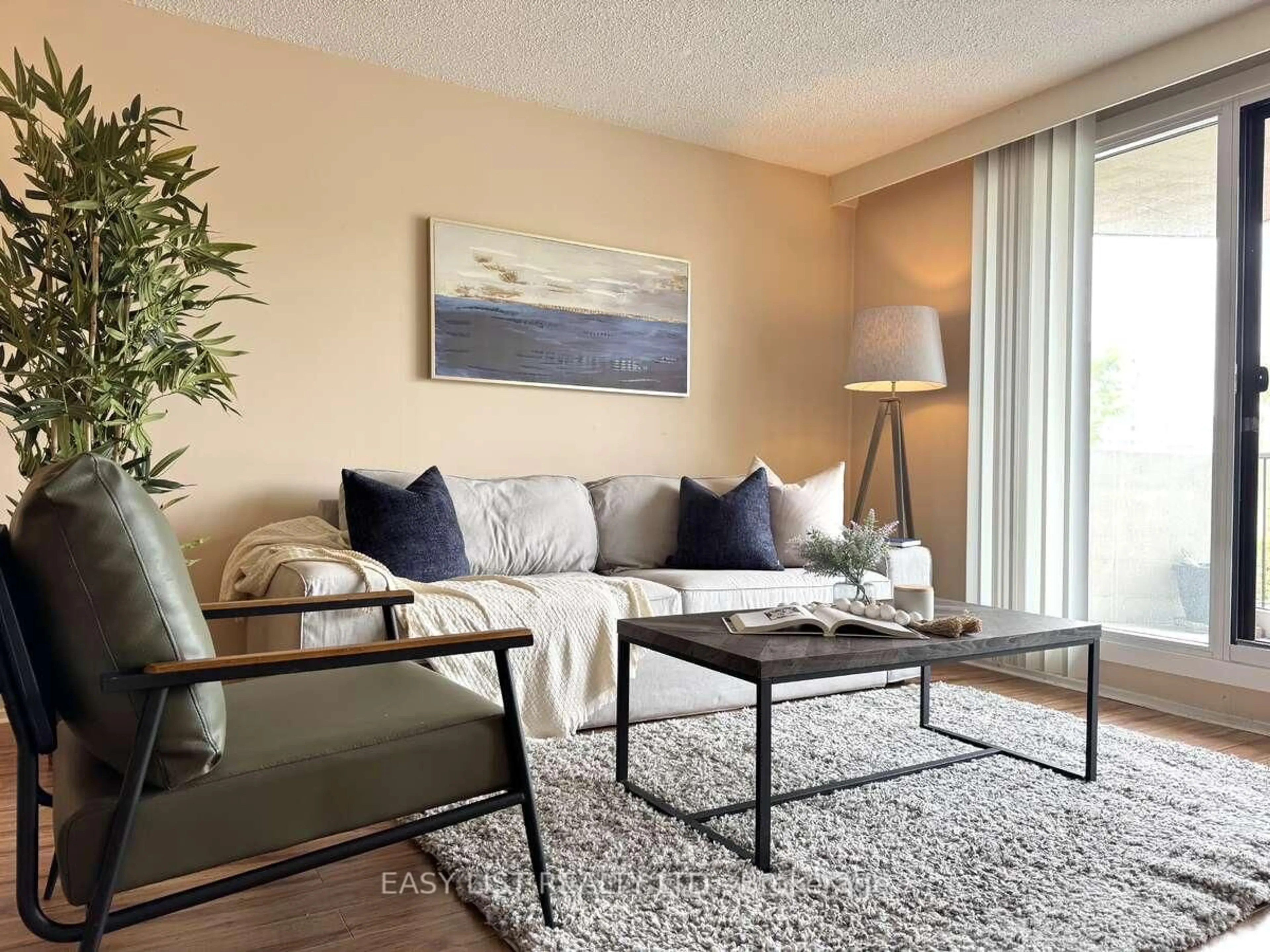 Living room with furniture, unknown for 1025 Richmond Rd #202, Ottawa Ontario K2B 8G8