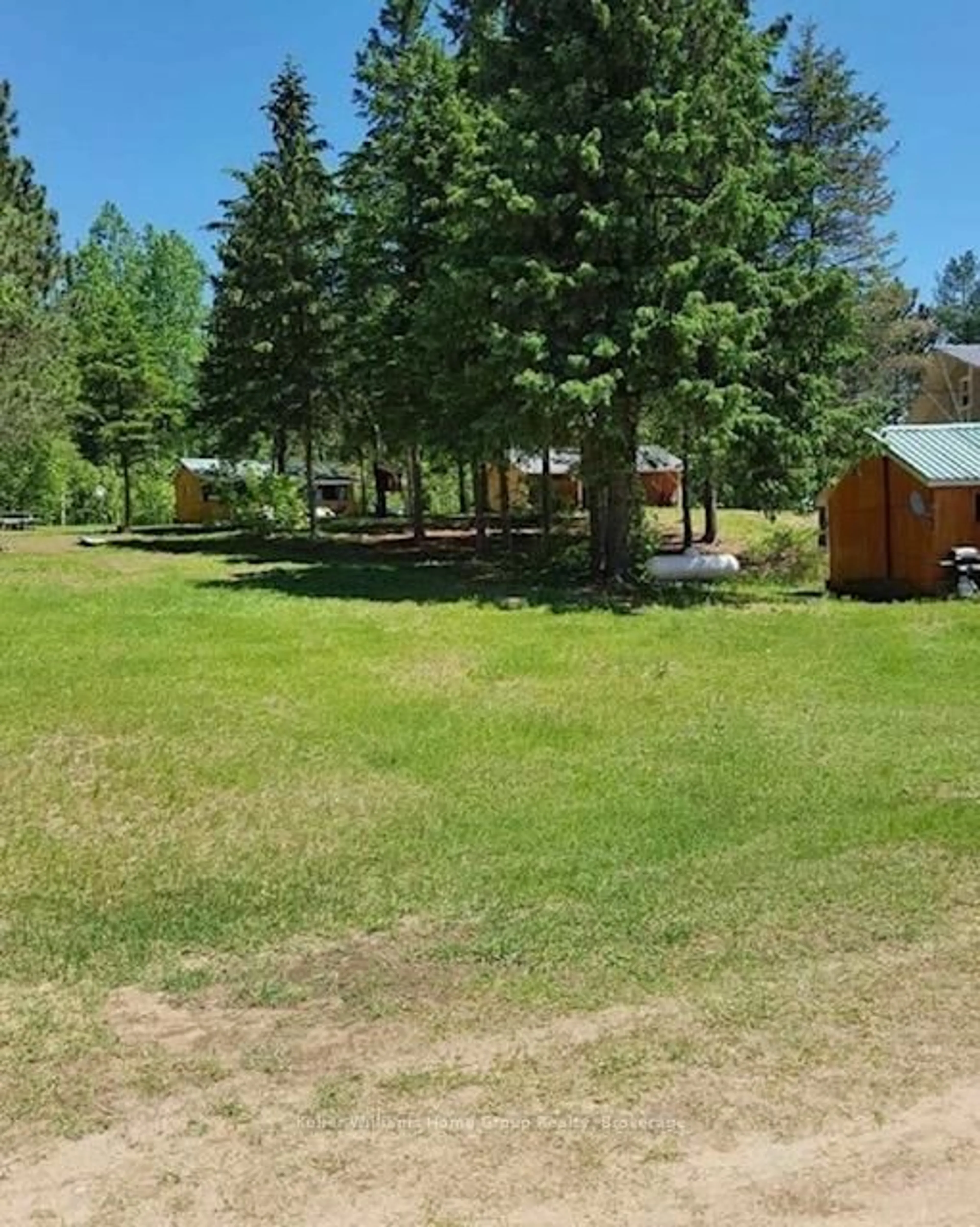 A pic from outside/outdoor area/front of a property/back of a property/a pic from drone, forest/trees view for 682 Long Lake Rd, Whitney Ontario K0J 2M0