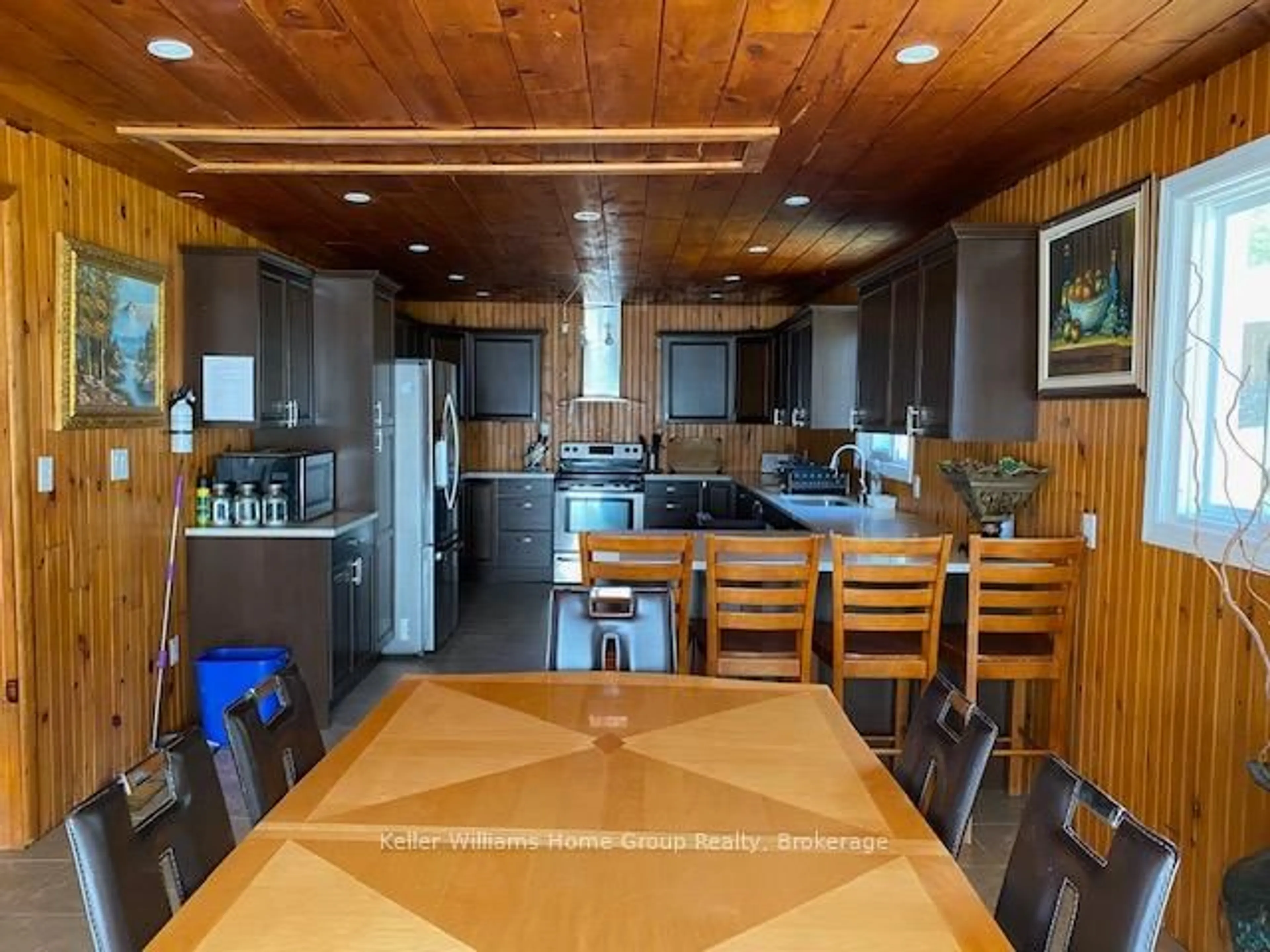 Open concept kitchen, wood/laminate floor for 682 Long Lake Rd, Whitney Ontario K0J 2M0