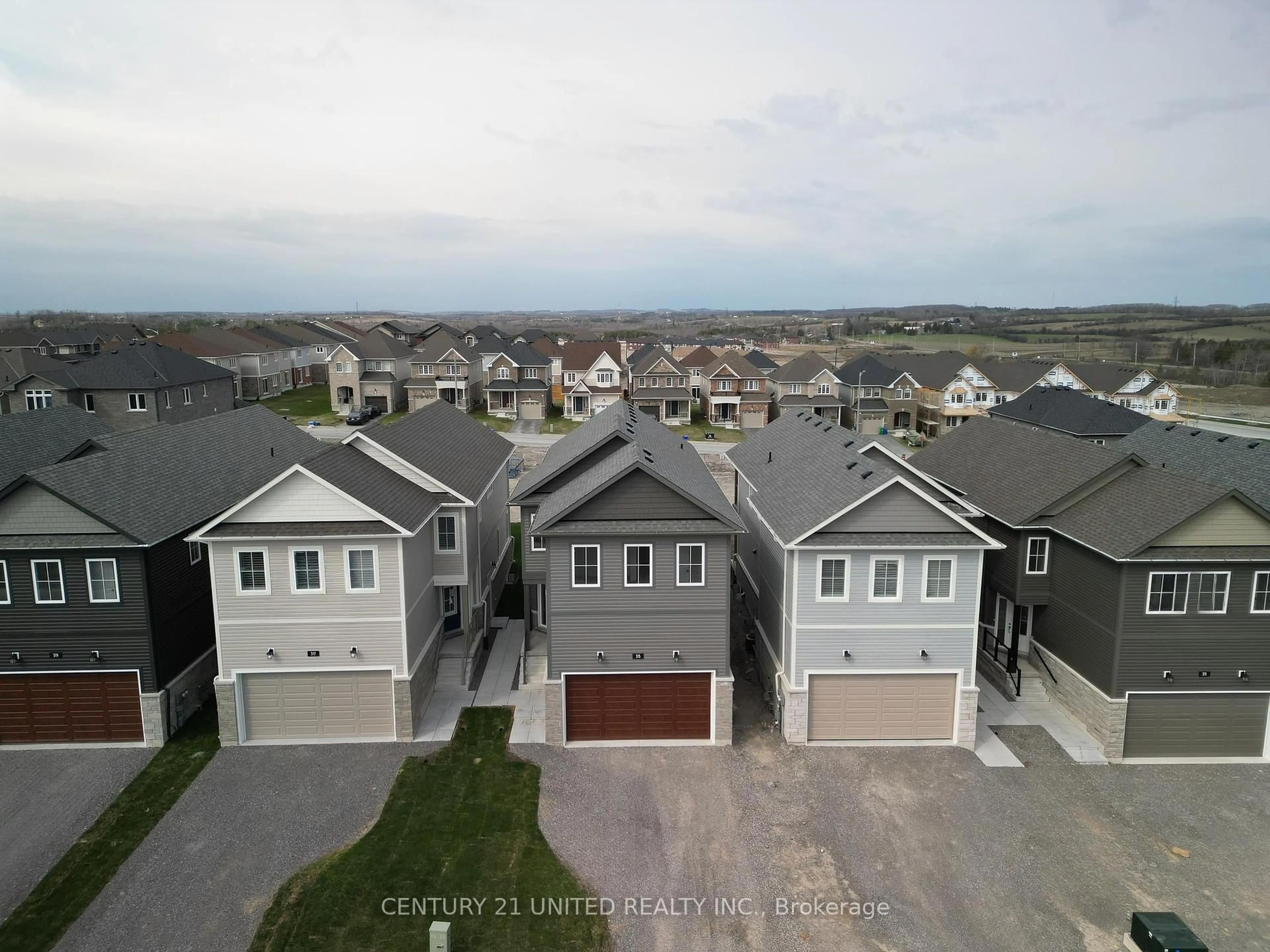 A pic from outside/outdoor area/front of a property/back of a property/a pic from drone, street for 315 Mullighan Gdns, Peterborough North Ontario K9K 0H2