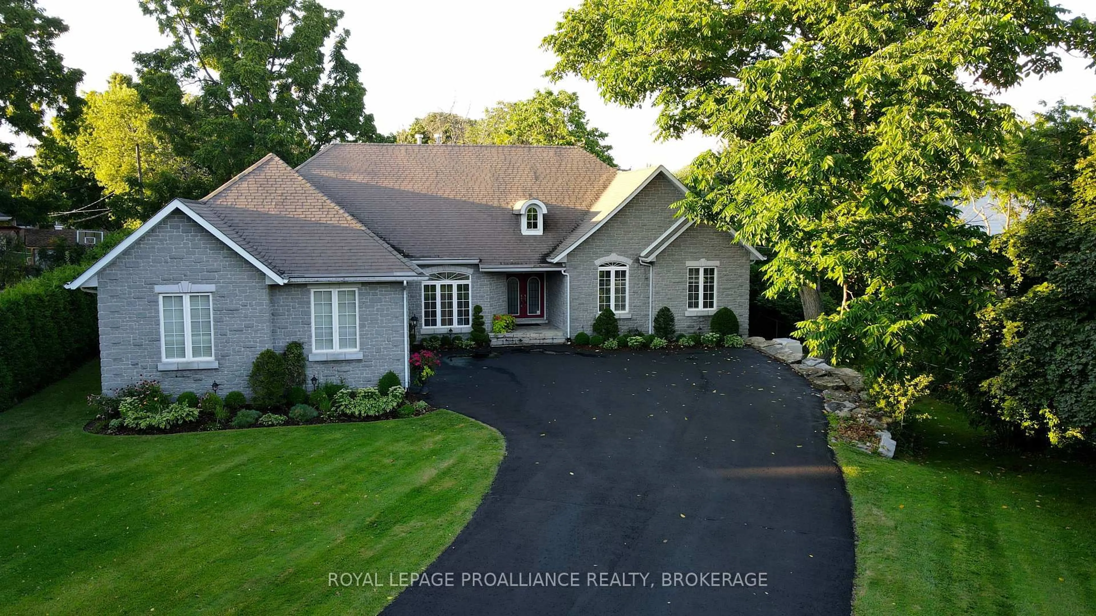 A pic from outside/outdoor area/front of a property/back of a property/a pic from drone, street for 782 Front Rd, Kingston Ontario K7M 4L9