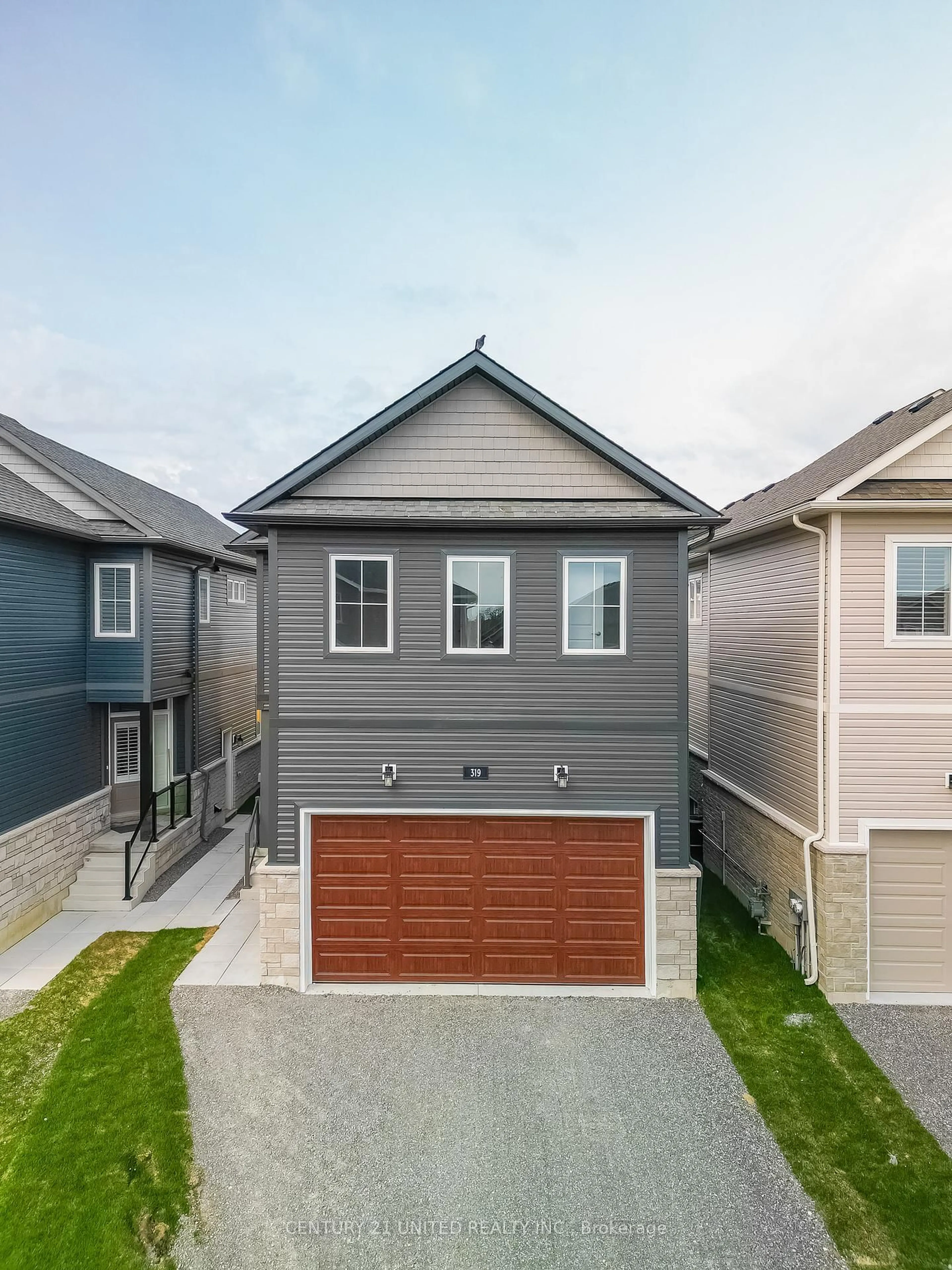 A pic from outside/outdoor area/front of a property/back of a property/a pic from drone, street for 319 Mullighan Gdns, Peterborough North Ontario K9K 0H2