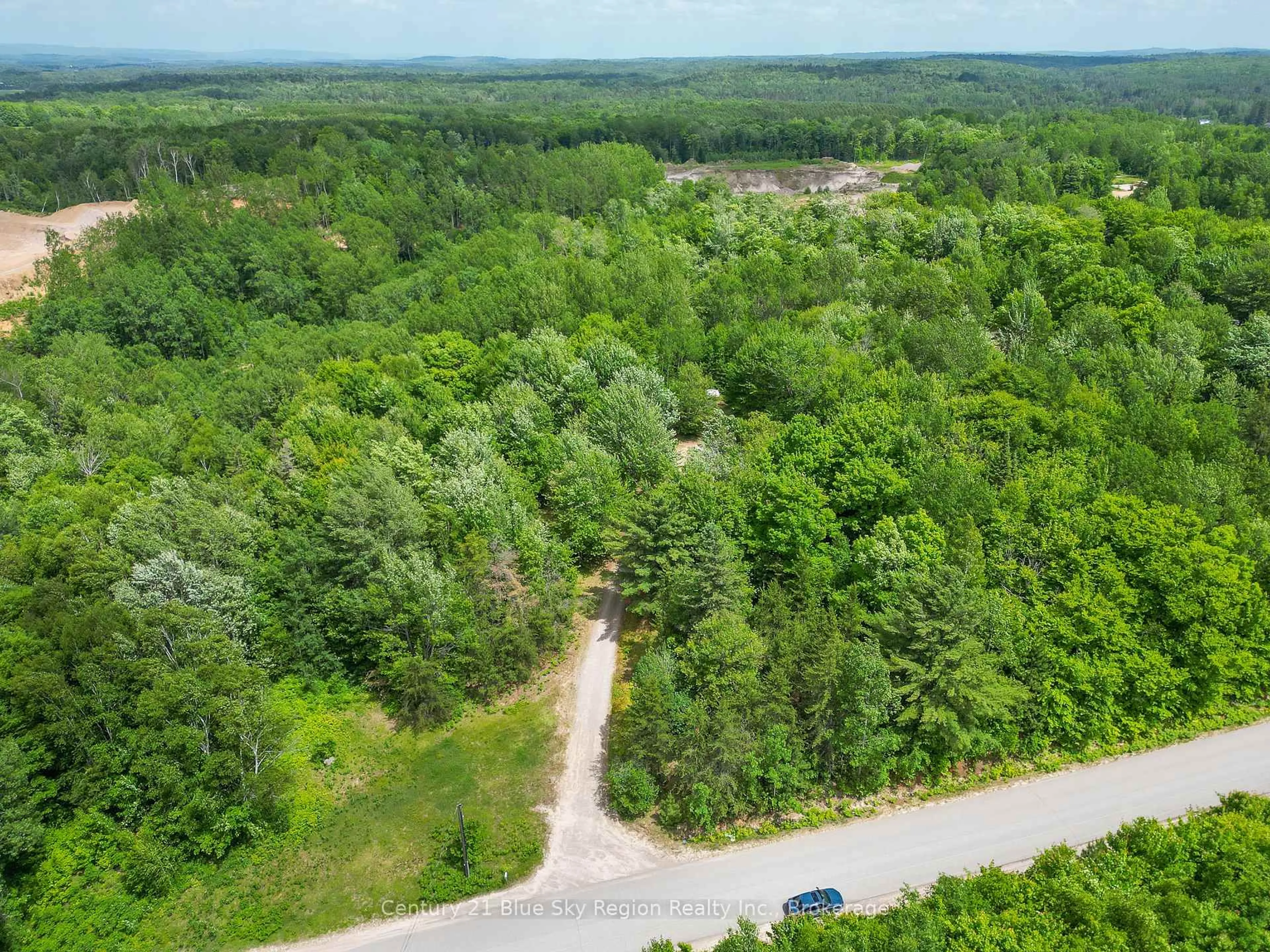 A pic from outside/outdoor area/front of a property/back of a property/a pic from drone, forest/trees view for 120 Blue Sea Rd, Bonfield Ontario P0H 1E0