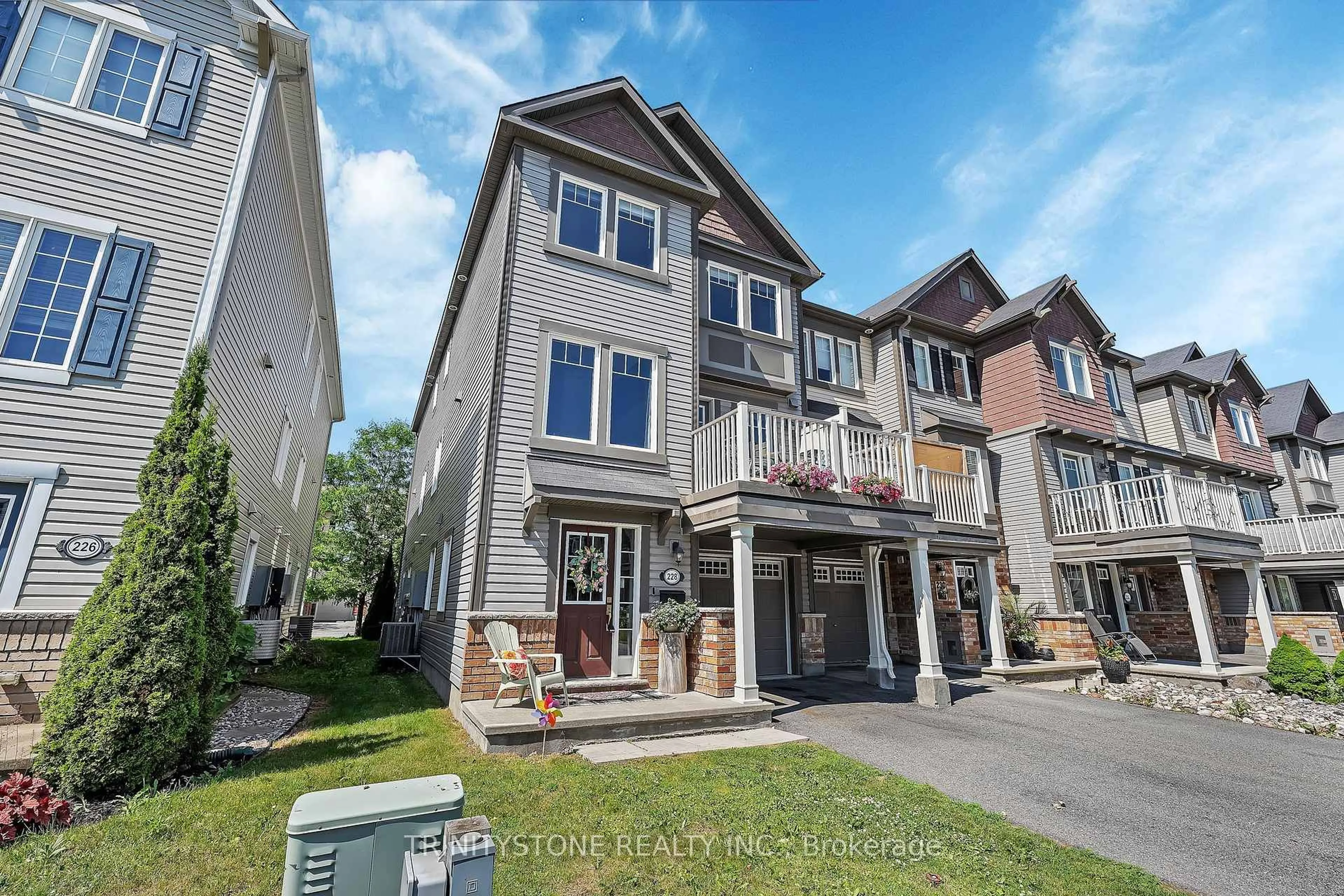 Home with vinyl exterior material, street for 228 Cayman Rd, Ottawa Ontario K2S 0N8