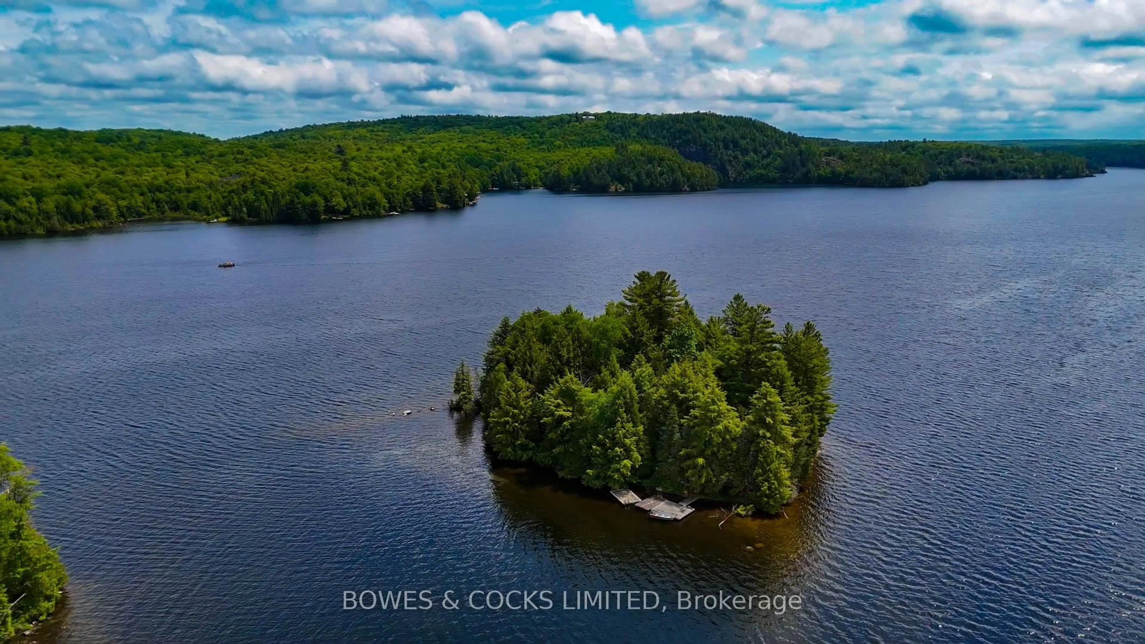 A pic from outside/outdoor area/front of a property/back of a property/a pic from drone, water/lake/river/ocean view for 1117 Thunderbird Lane, Birch Island, Highlands East Ontario K0L 1M0