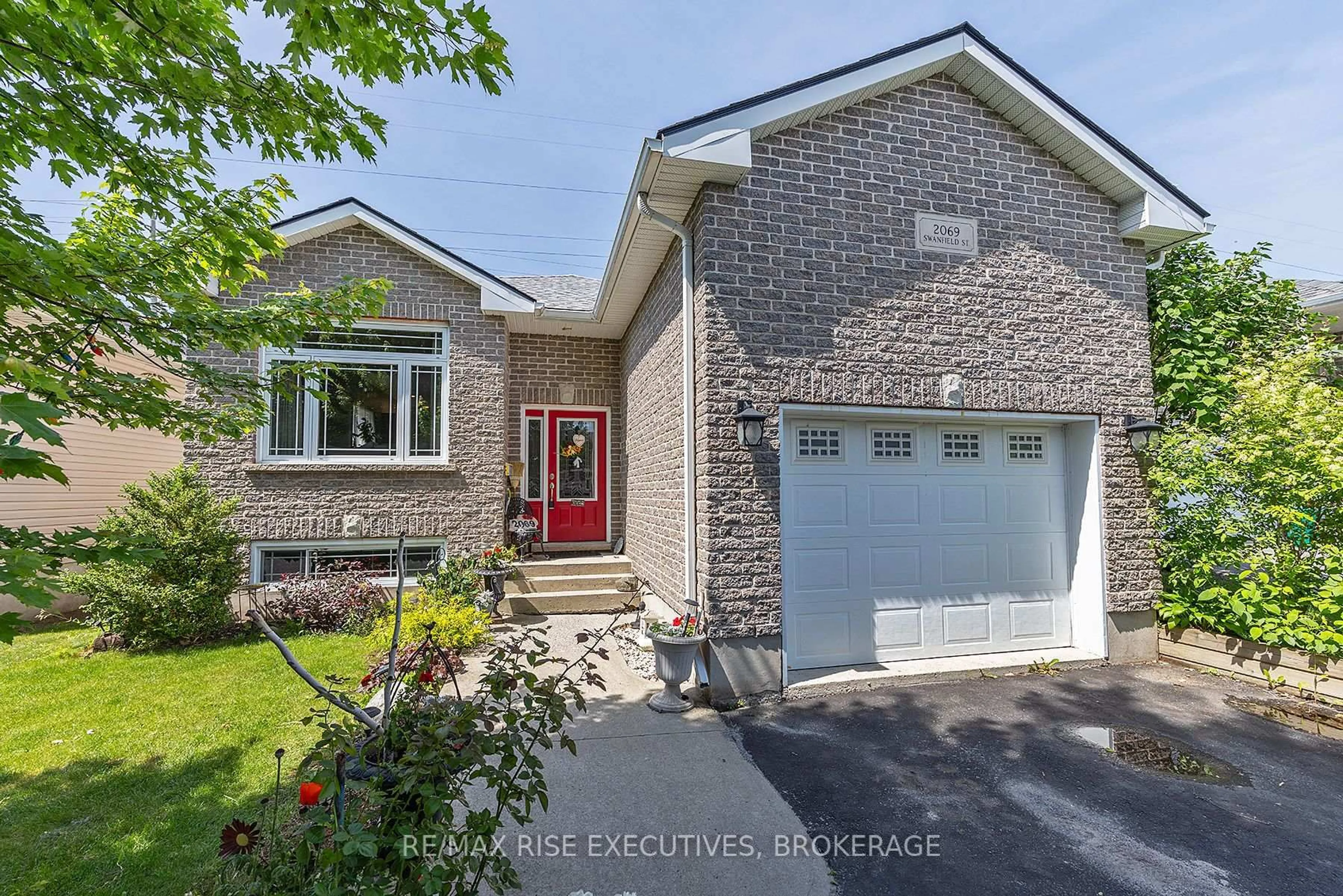 Home with brick exterior material, street for 2069 Swanfield St, Kingston Ontario K7M 0A9