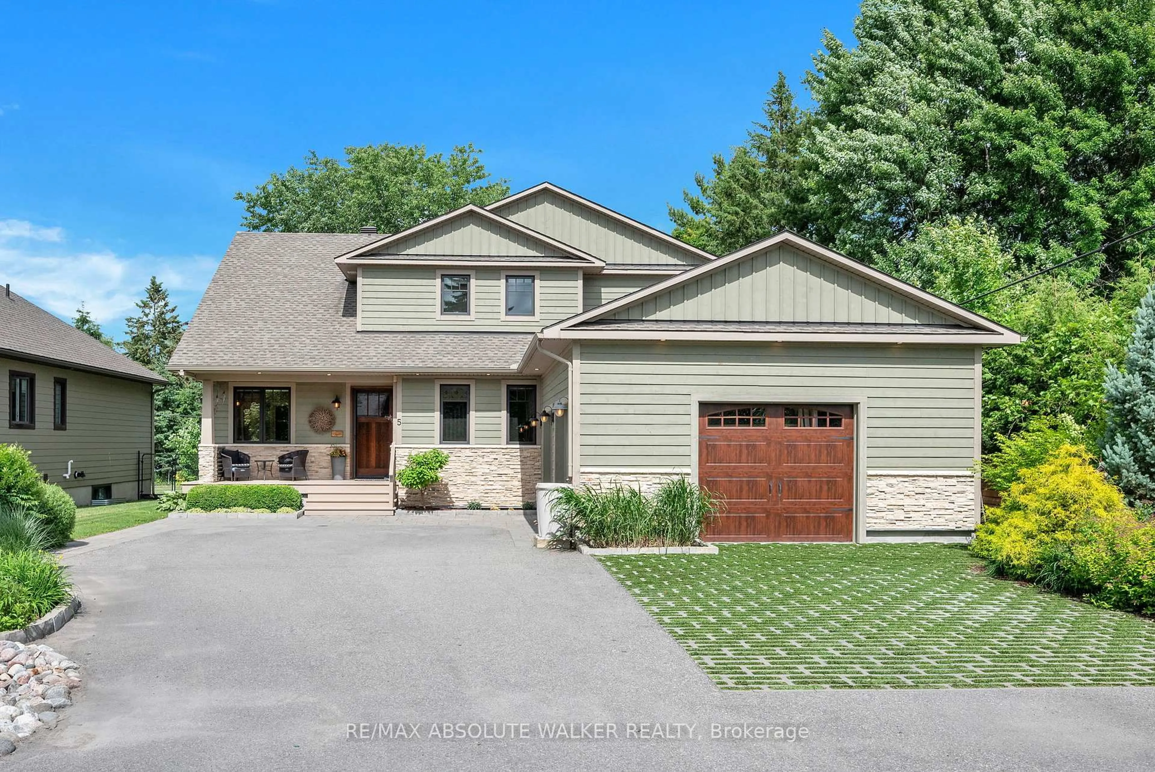Home with brick exterior material, street for 5 Melva Ave, Ottawa Ontario K1T 3W9