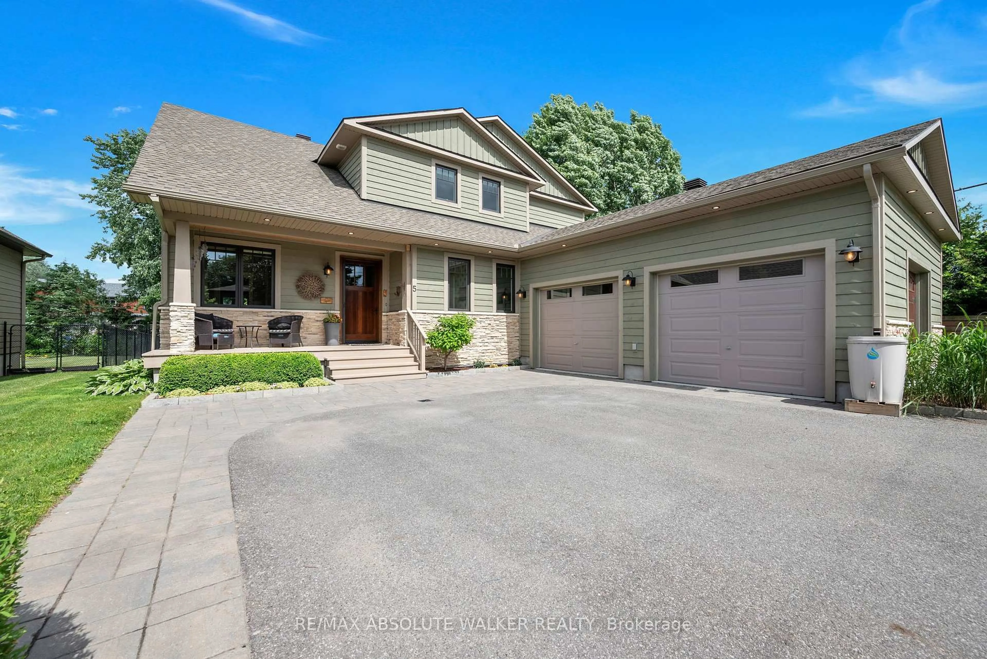 Home with brick exterior material, street for 5 Melva Ave, Ottawa Ontario K1T 3W9