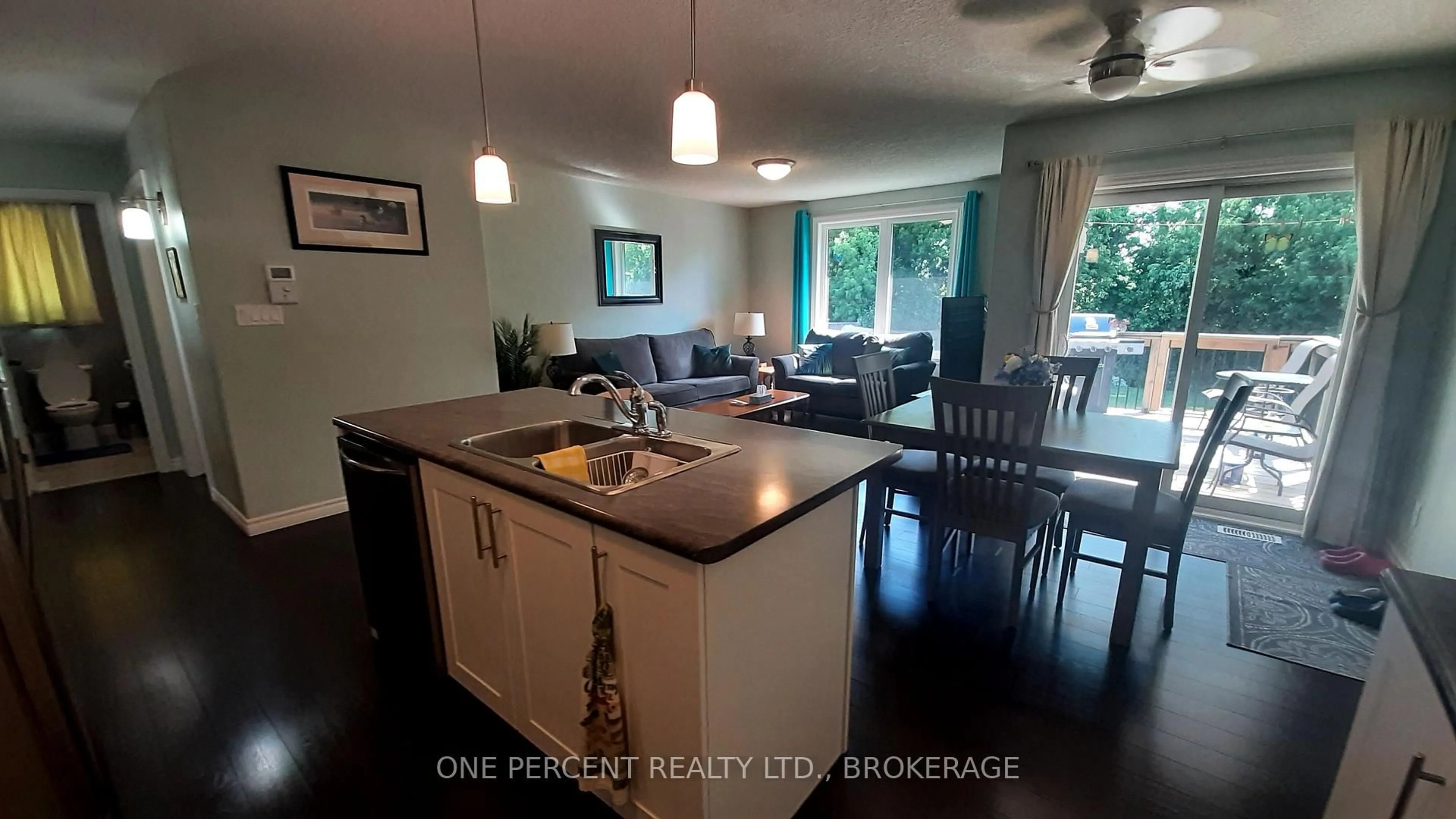 Open concept kitchen, wood/laminate floor for 163 Greenhill Lane, Belleville Ontario K8N 0C7