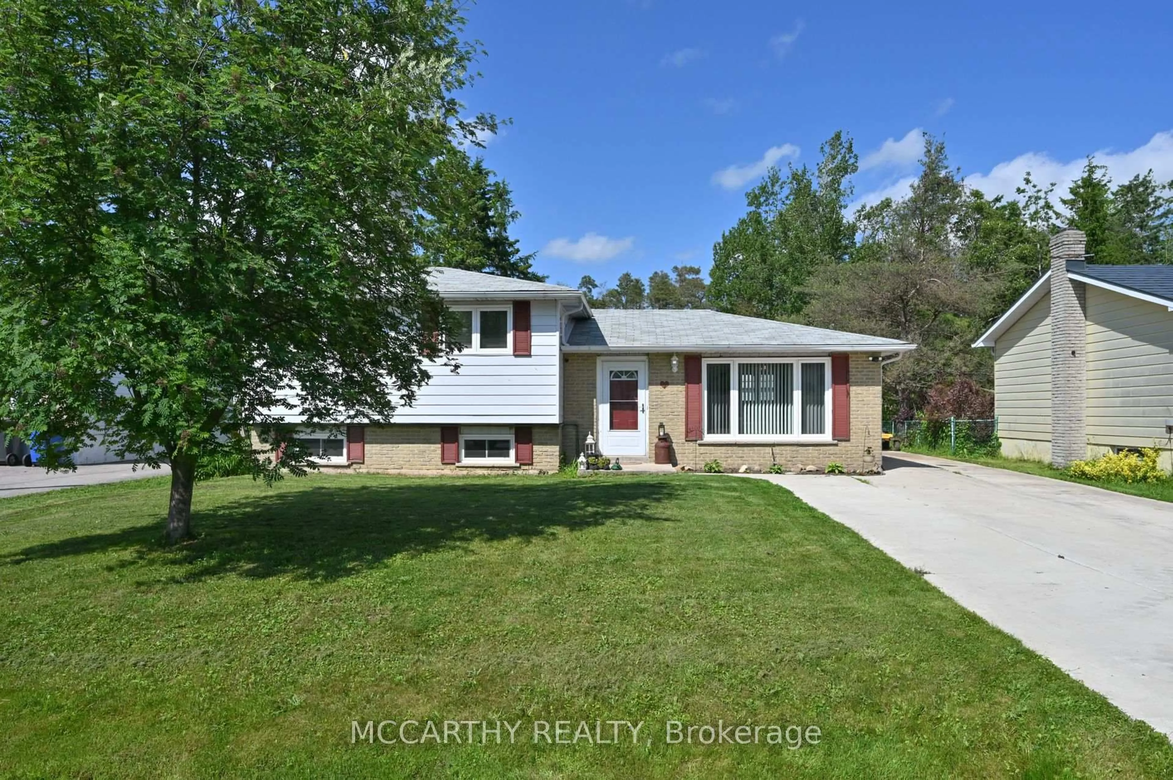 Home with vinyl exterior material, street for 7 McDowell St, Southgate Ontario N0C 1B0