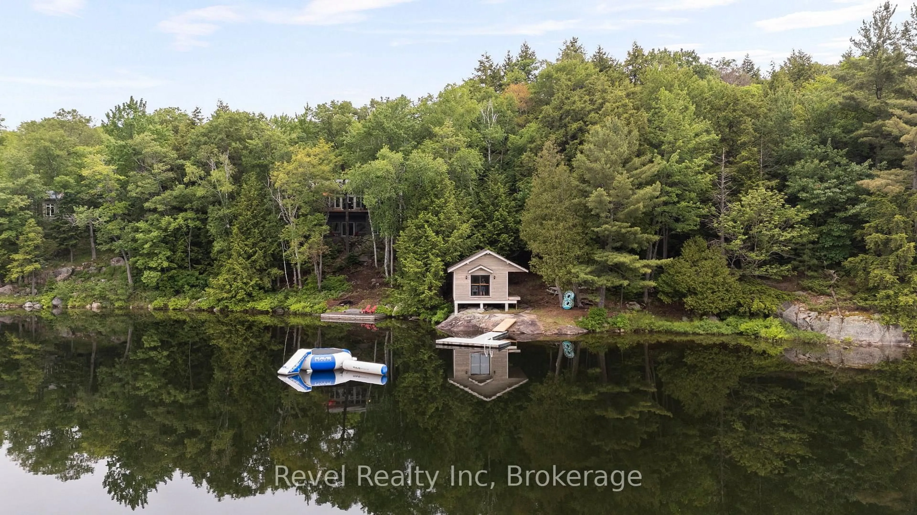A pic from outside/outdoor area/front of a property/back of a property/a pic from drone, water/lake/river/ocean view for 30 Sparrow Rd, Seguin Ontario P0C 1J0