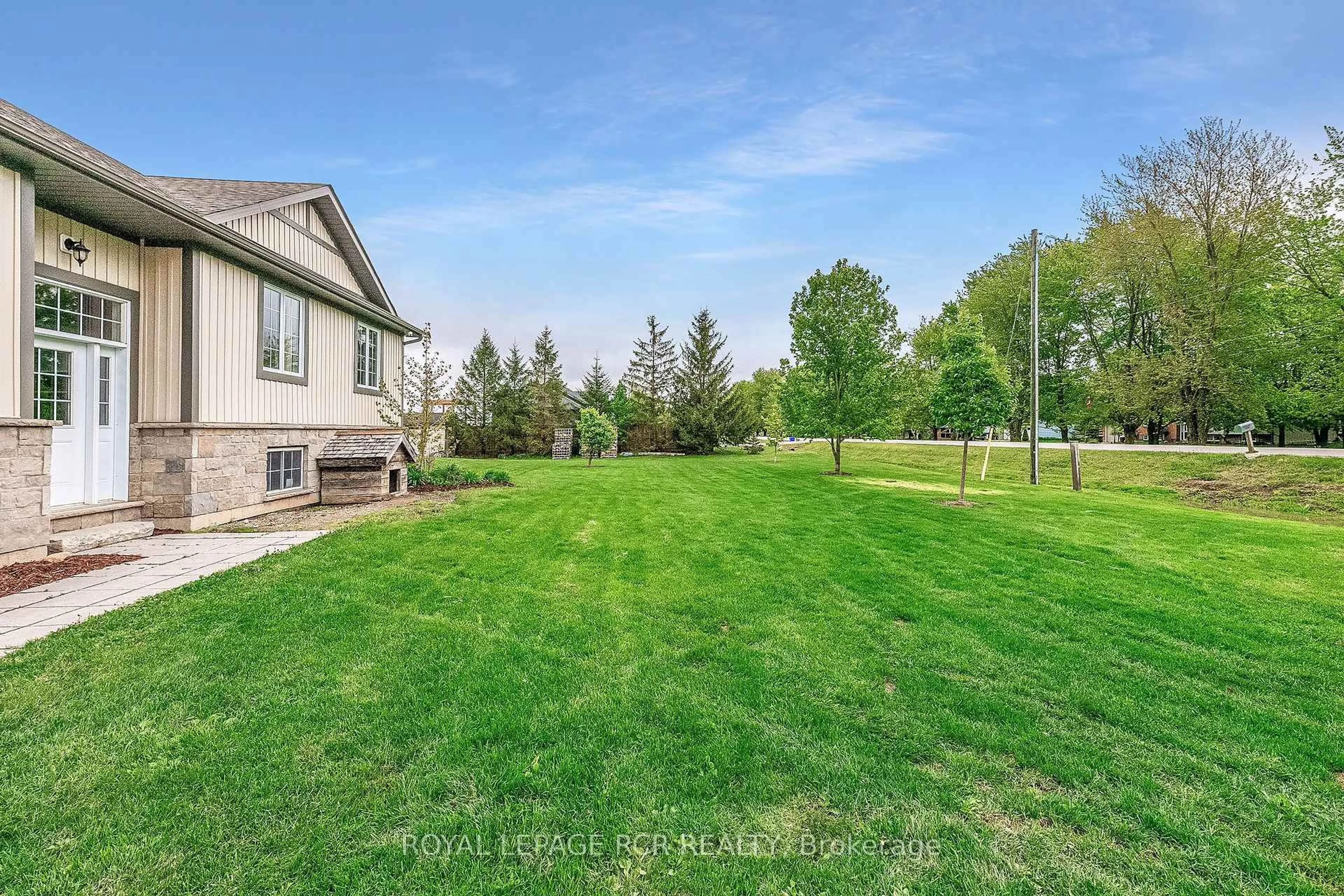 A pic from outside/outdoor area/front of a property/back of a property/a pic from drone, water/lake/river/ocean view for 402187 County Road 15, East Luther Grand Valley Ontario L9W 3B5
