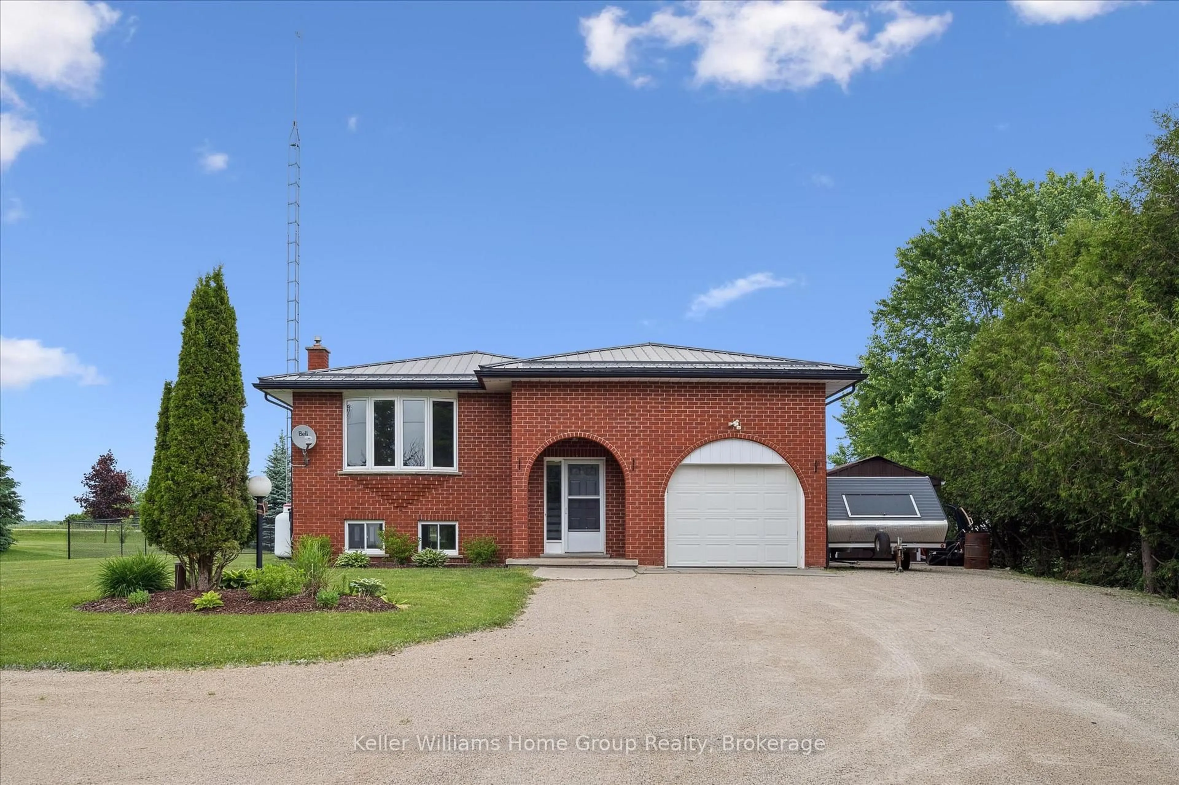 Home with brick exterior material, street for 9505 Maas Park Dr, Wellington North Ontario N0G 2L0