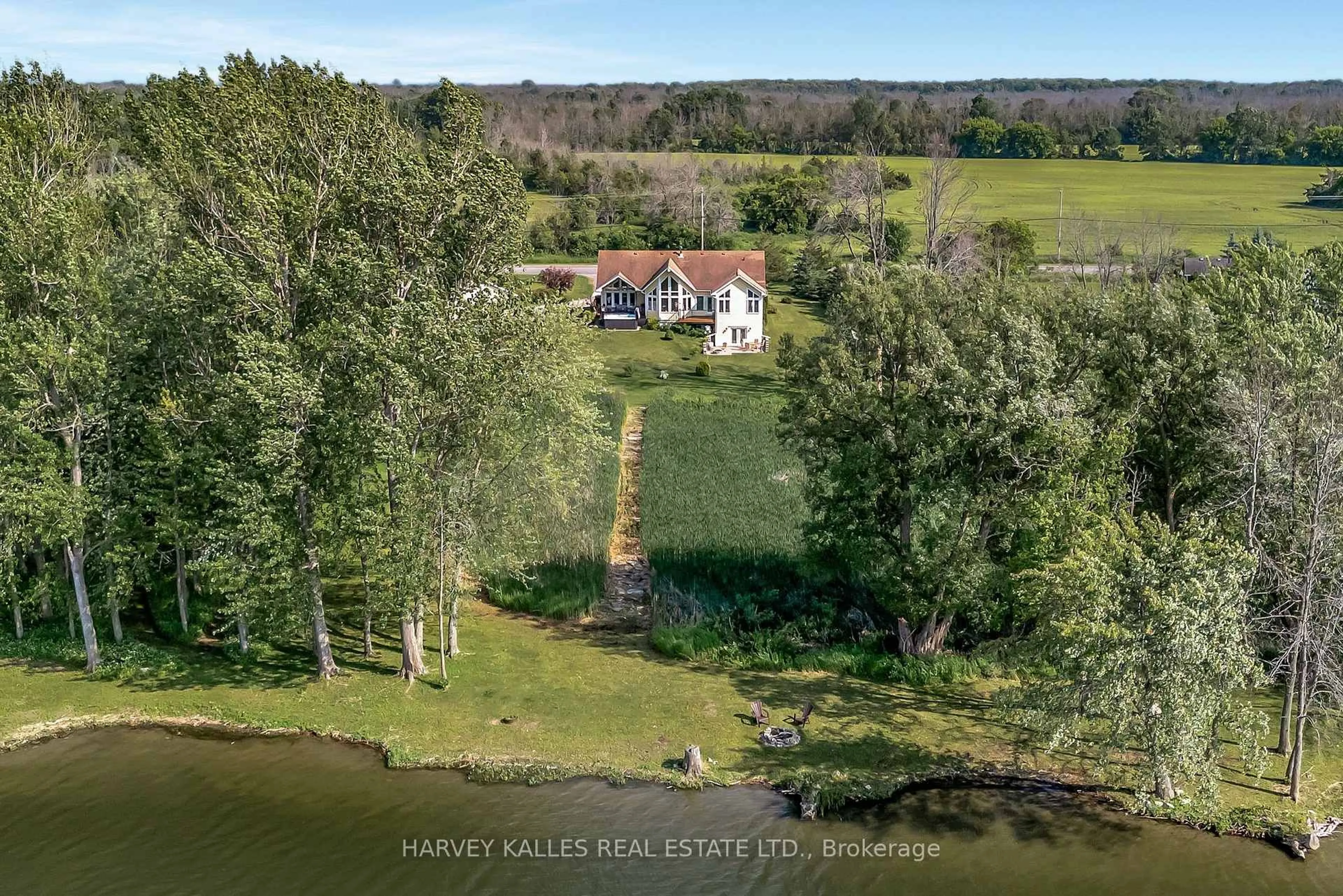 A pic from outside/outdoor area/front of a property/back of a property/a pic from drone, water/lake/river/ocean view for 2535 County Road 13 Rd, Prince Edward County Ontario K0K 2T0