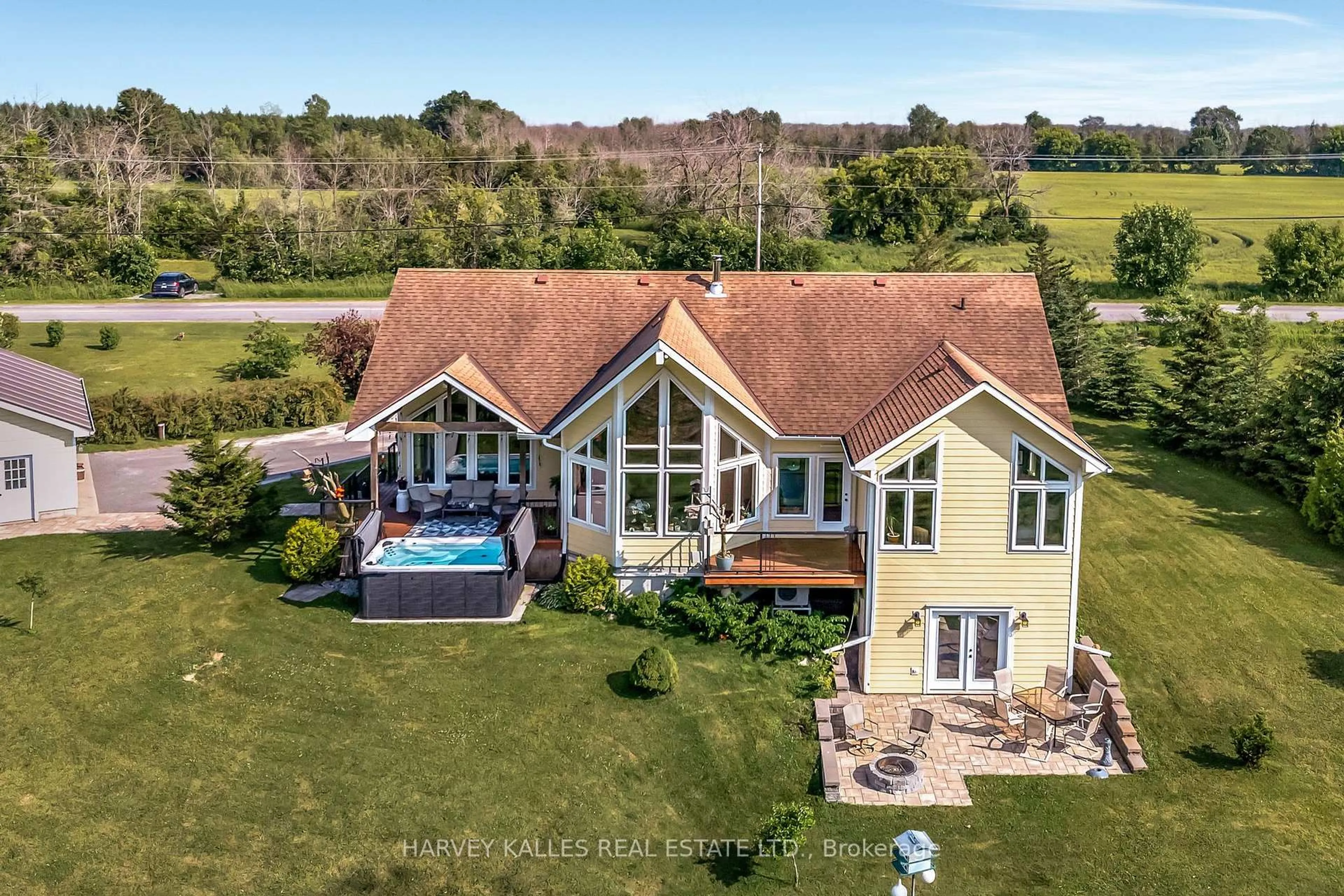 A pic from outside/outdoor area/front of a property/back of a property/a pic from drone, water/lake/river/ocean view for 2535 County Road 13 Rd, Prince Edward County Ontario K0K 2T0