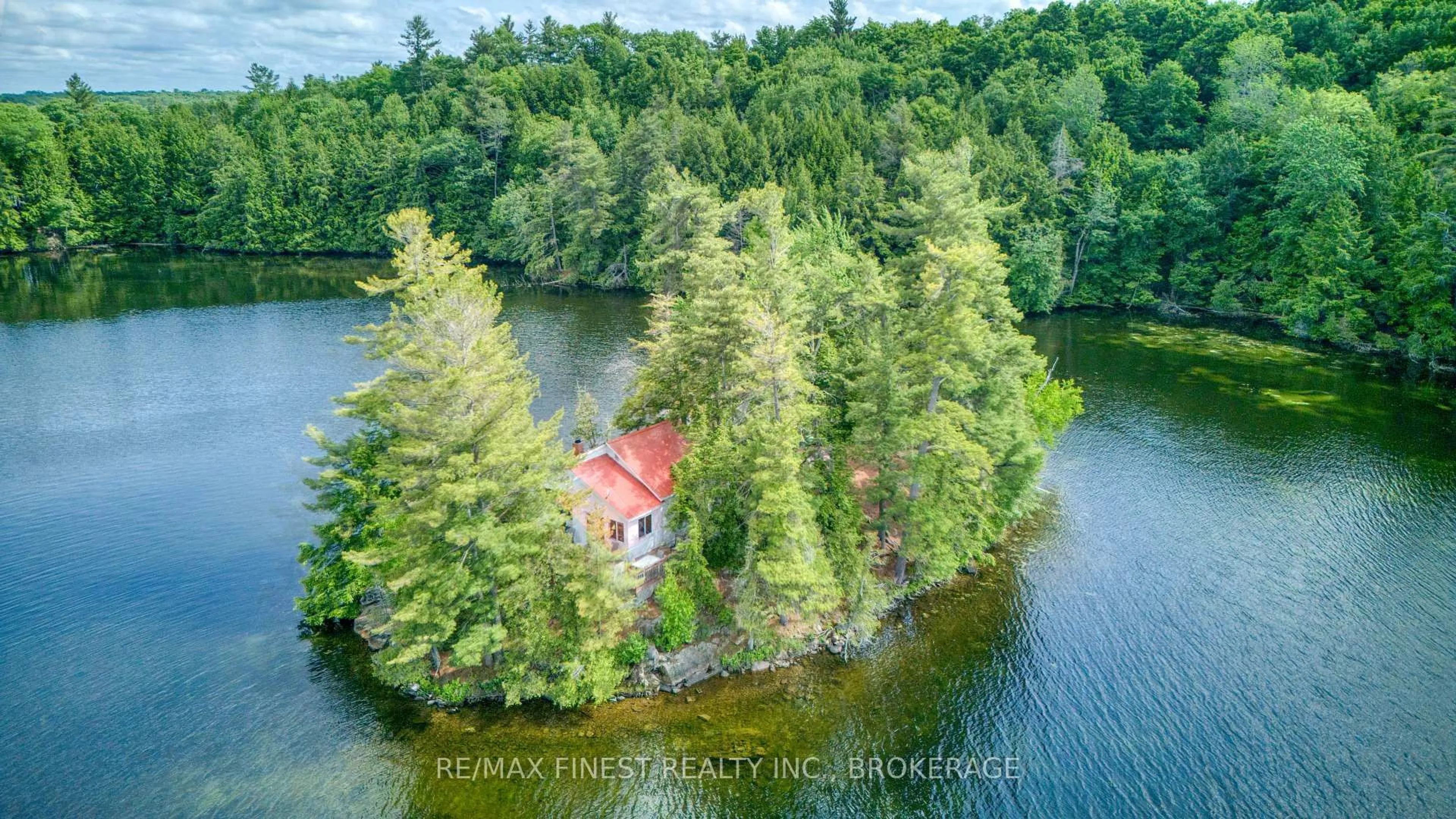 A pic from outside/outdoor area/front of a property/back of a property/a pic from drone, water/lake/river/ocean view for 259 Island 1, Sharbot Lake Ontario K0H 2P0