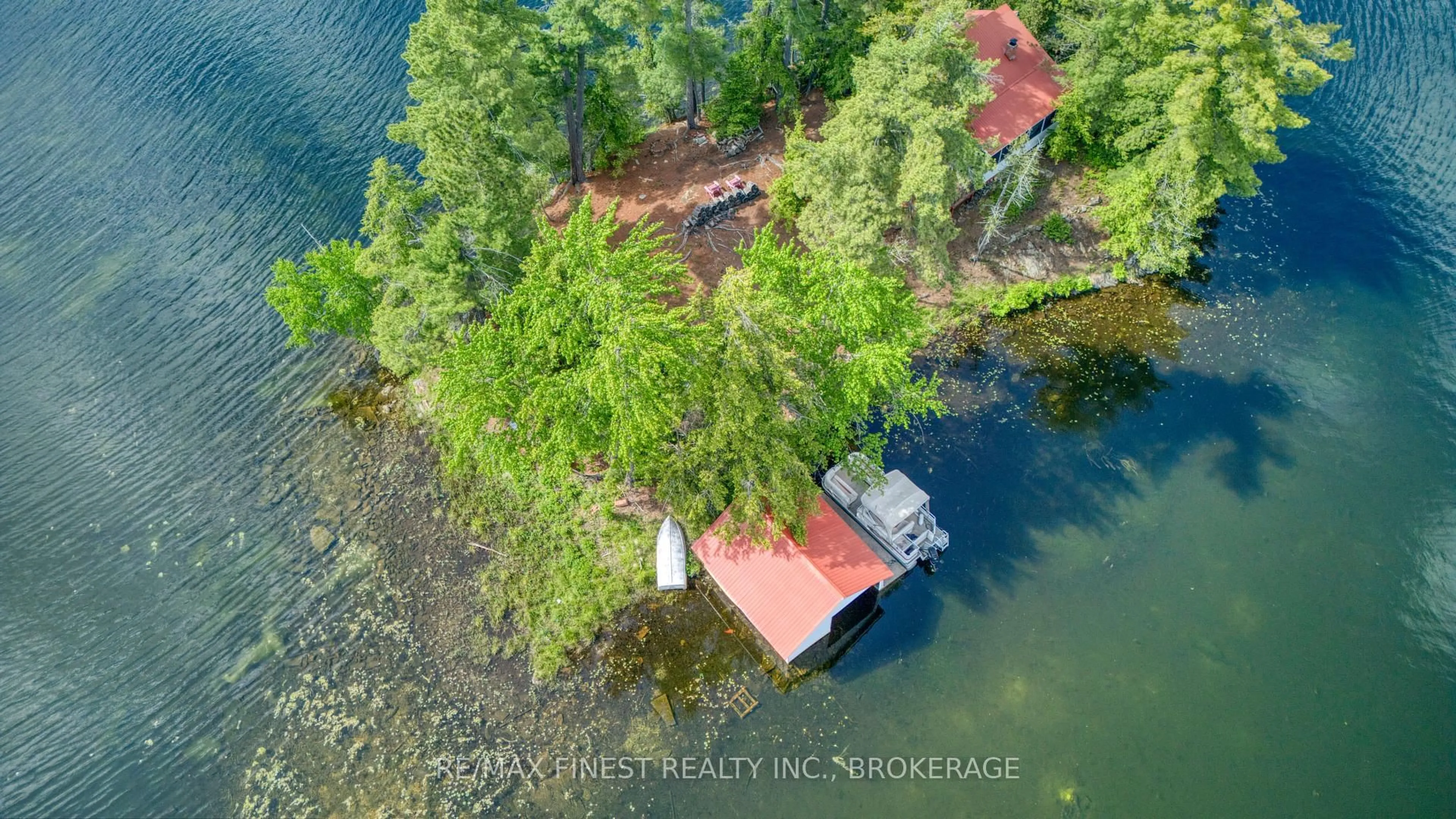A pic from outside/outdoor area/front of a property/back of a property/a pic from drone, water/lake/river/ocean view for 259 Island 1, Sharbot Lake Ontario K0H 2P0