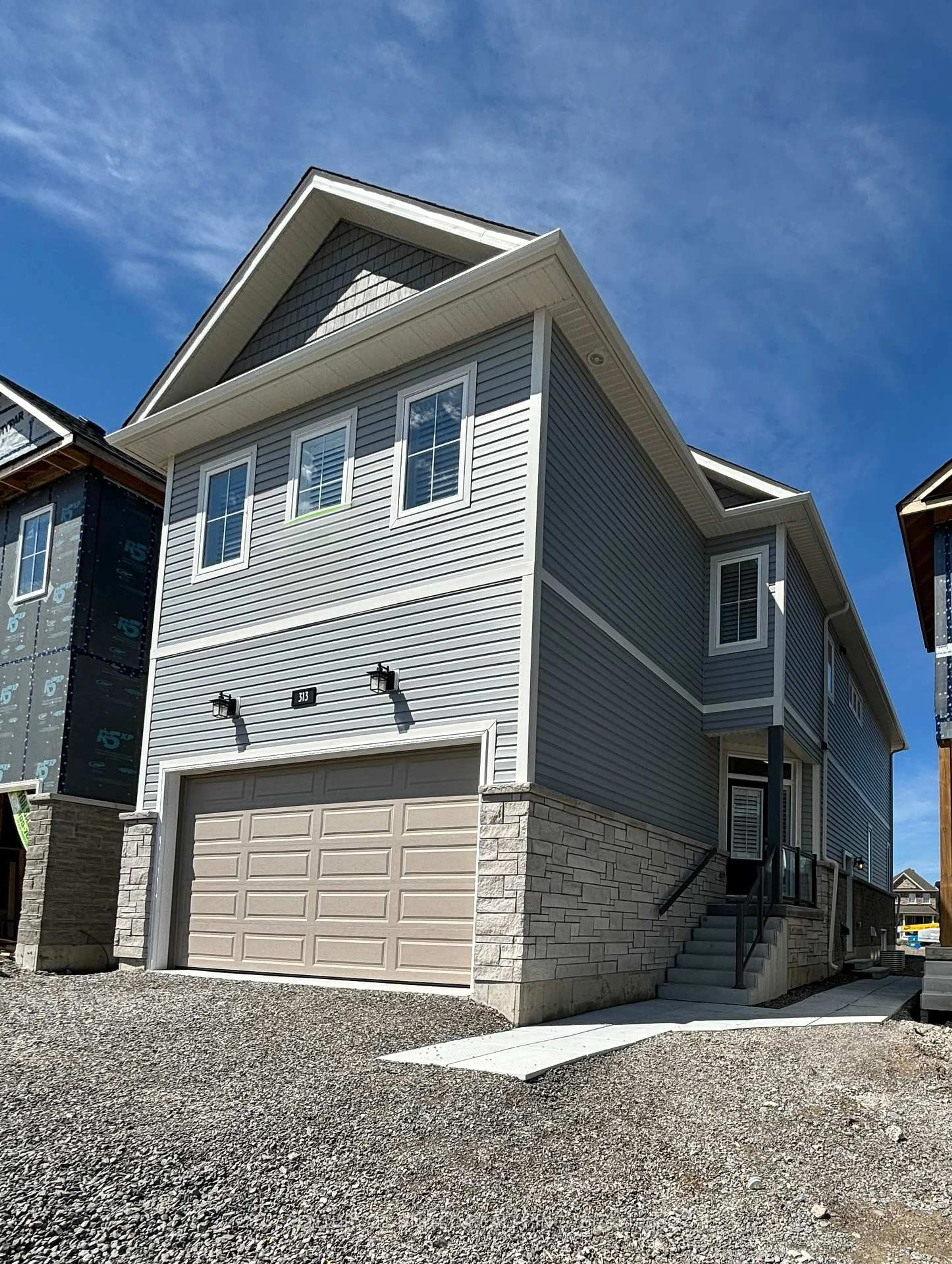 Home with vinyl exterior material, street for 313 Mullighan Gdns, Peterborough North Ontario K9K 0G3