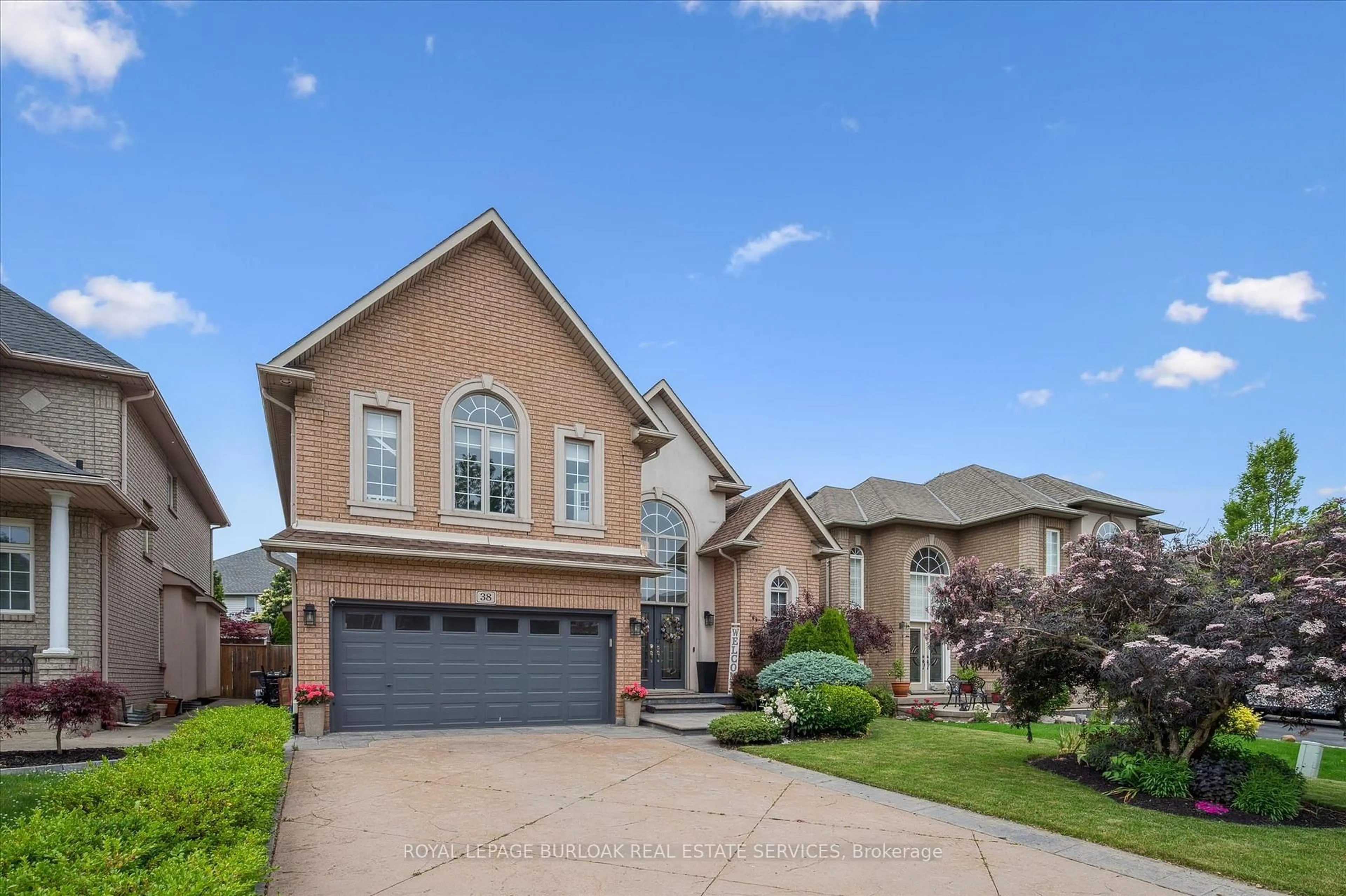 Home with brick exterior material, street for 38 Surrey Dr, Hamilton Ontario L9K 1L9
