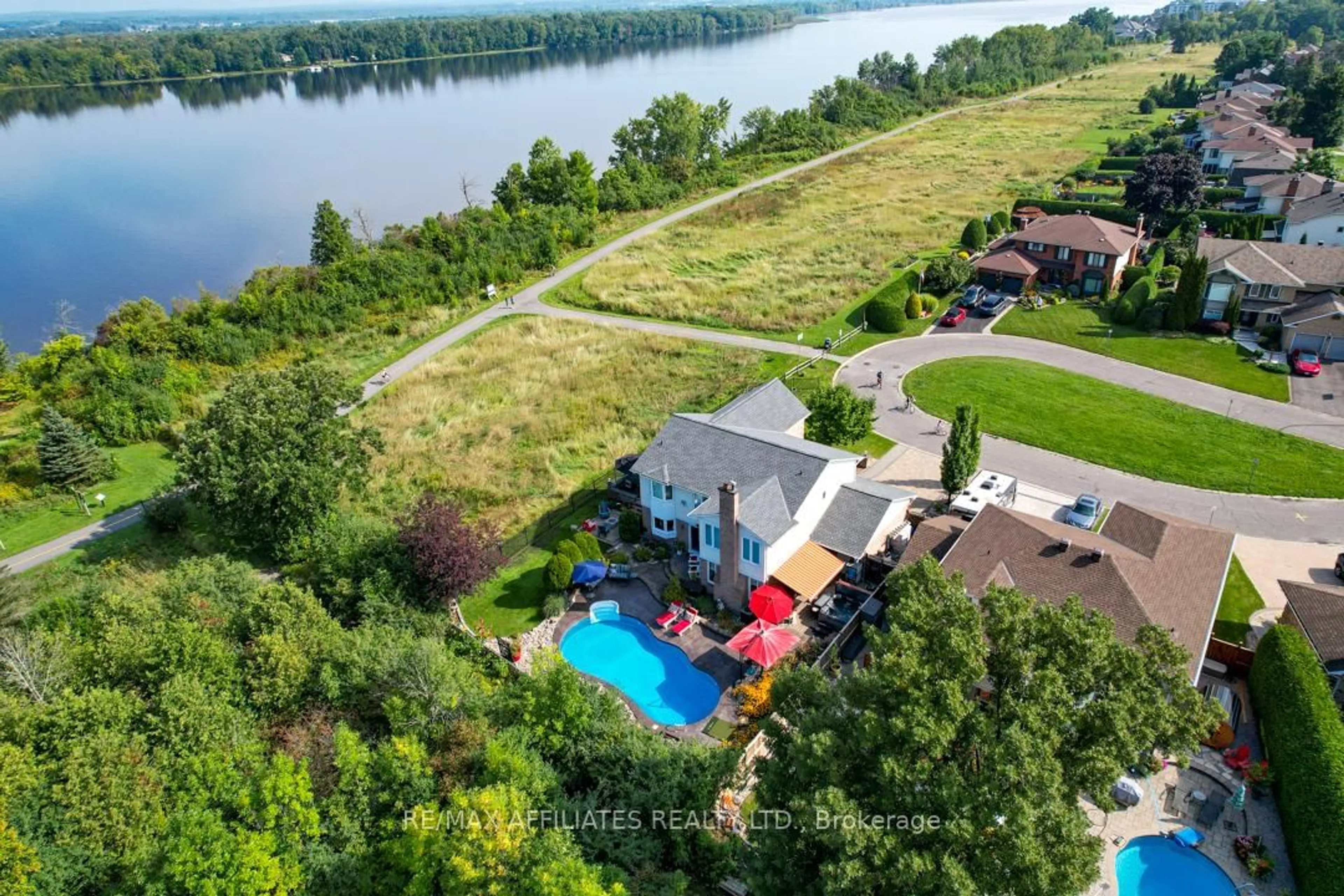 A pic from outside/outdoor area/front of a property/back of a property/a pic from drone, water/lake/river/ocean view for 800 Fairwinds Terr, Orleans Ontario K1C 2X6