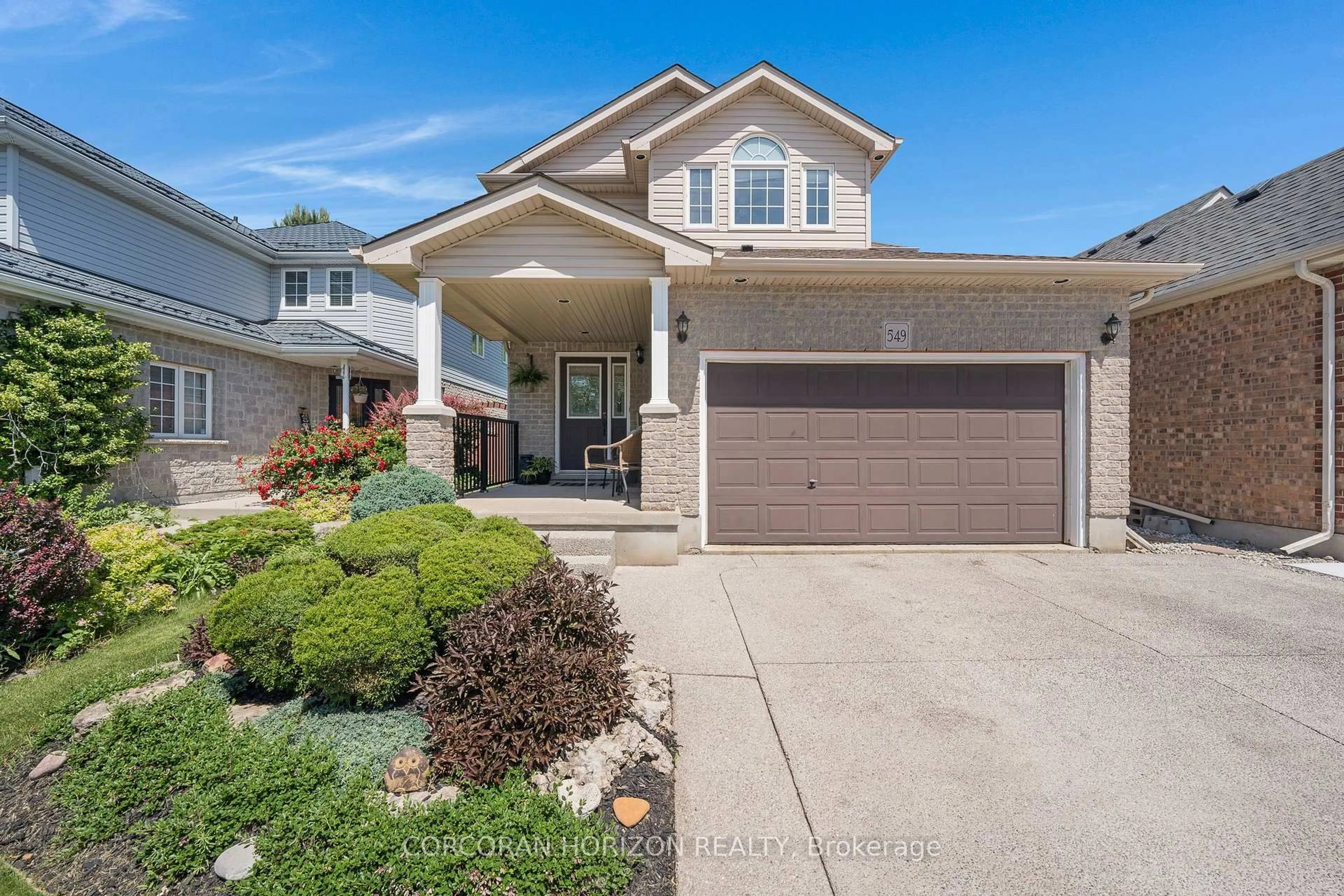 Home with vinyl exterior material, street for 549 Langlaw Dr, Cambridge Ontario N1P 1H8