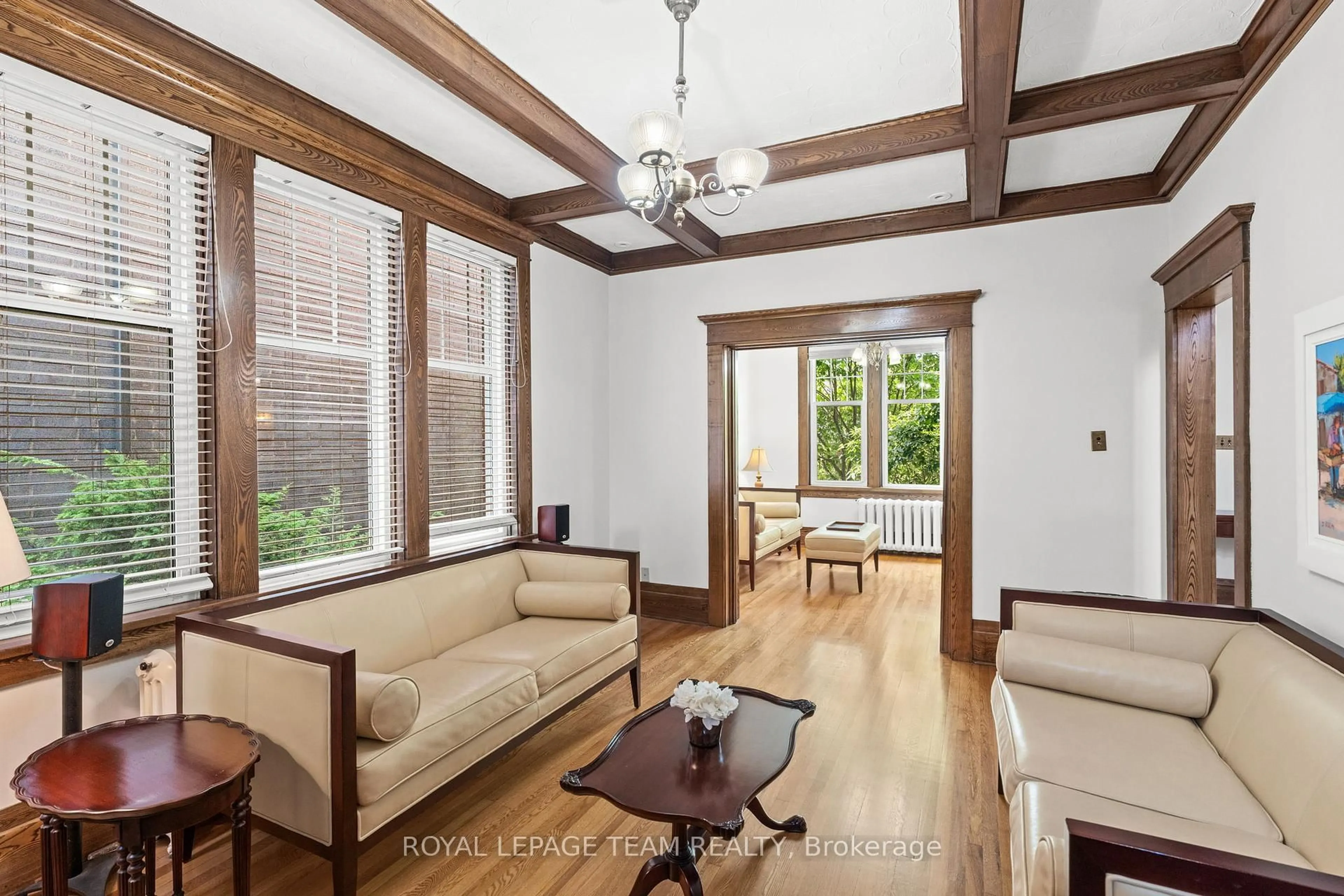 Living room with furniture, wood/laminate floor for 3 Allan Pl, Ottawa Ontario K1S 3S9