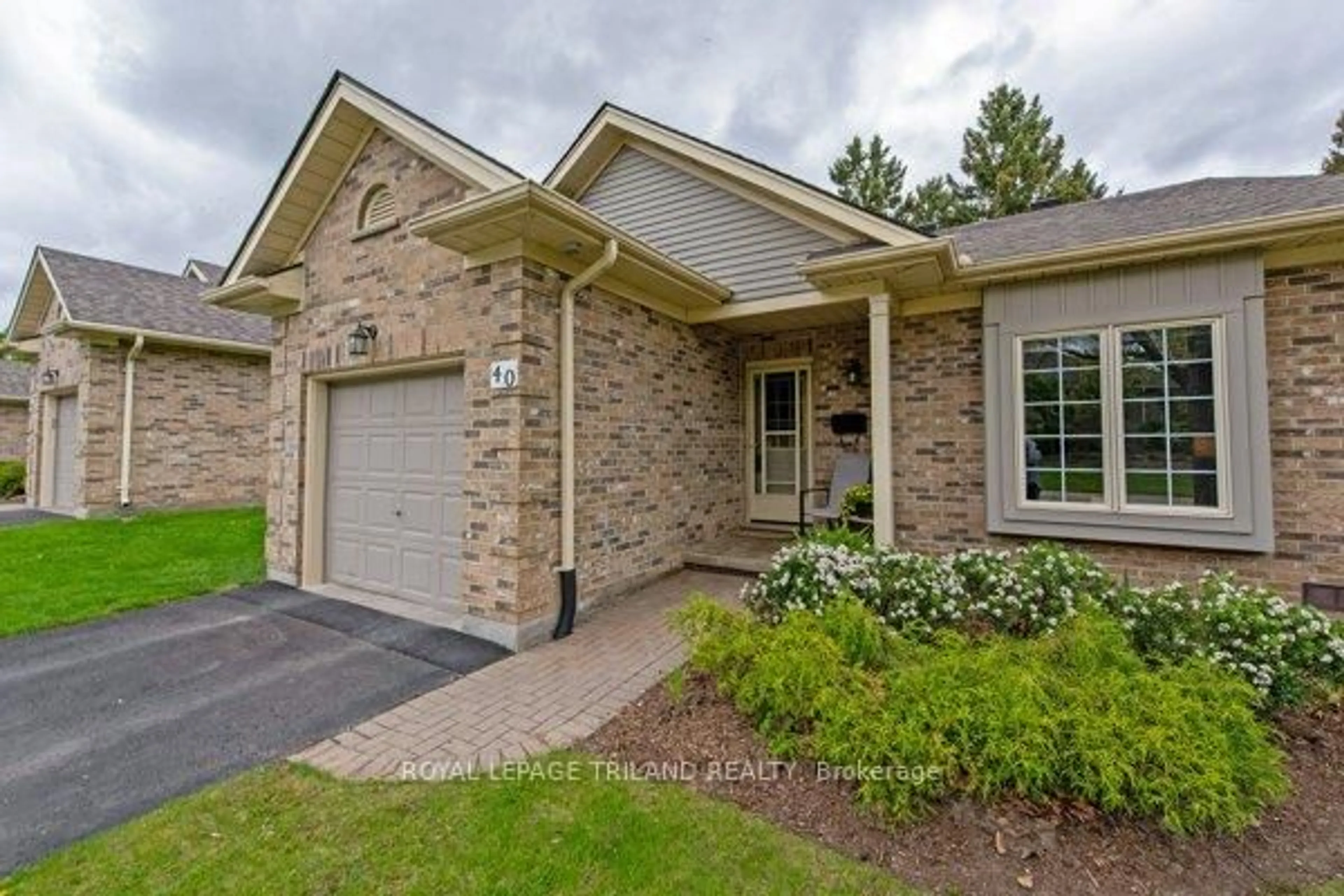 Home with brick exterior material, street for 1241 Hamilton Rd #40, London East Ontario N5W 6B3