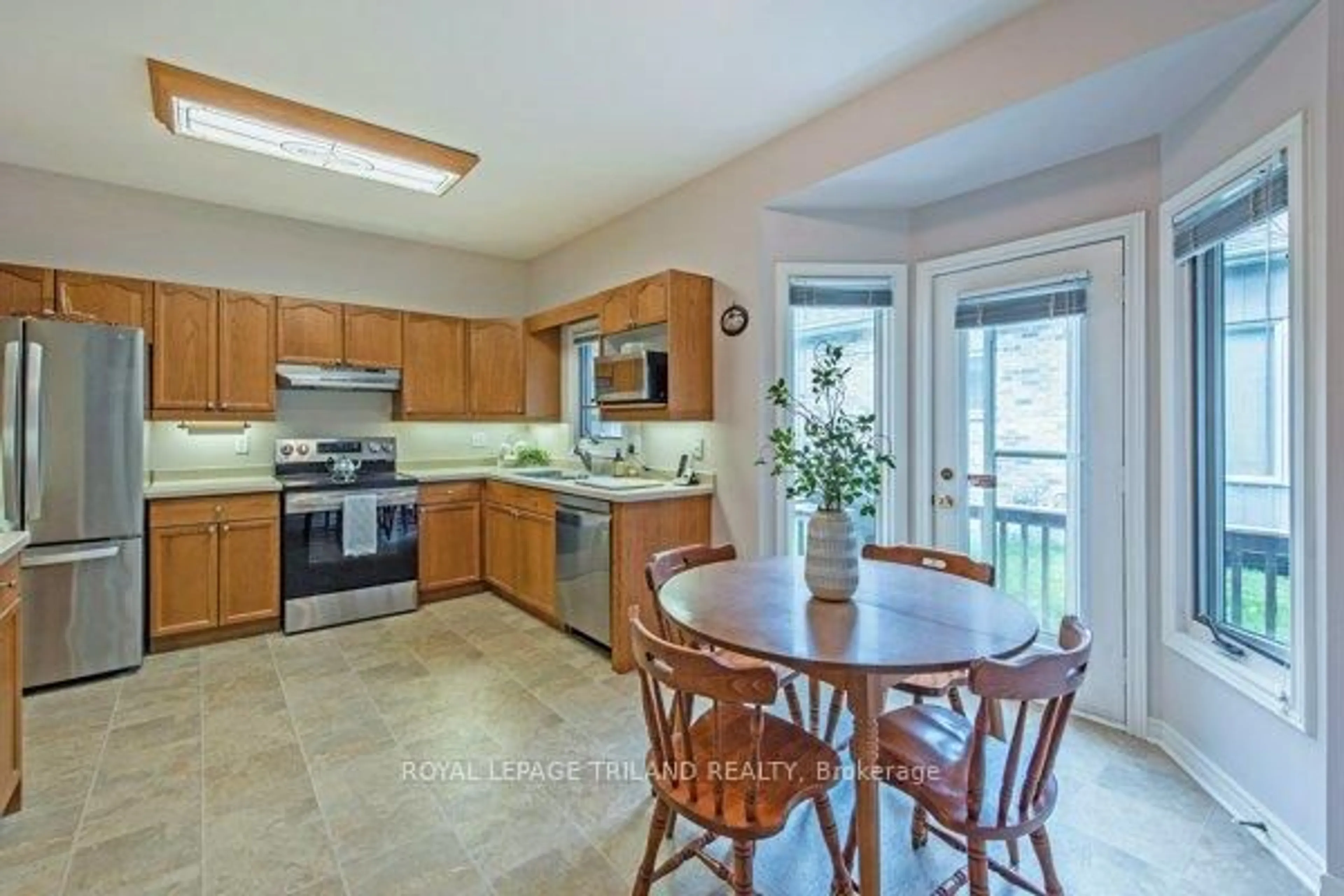 Open concept kitchen, ceramic/tile floor for 1241 Hamilton Rd #40, London East Ontario N5W 6B3