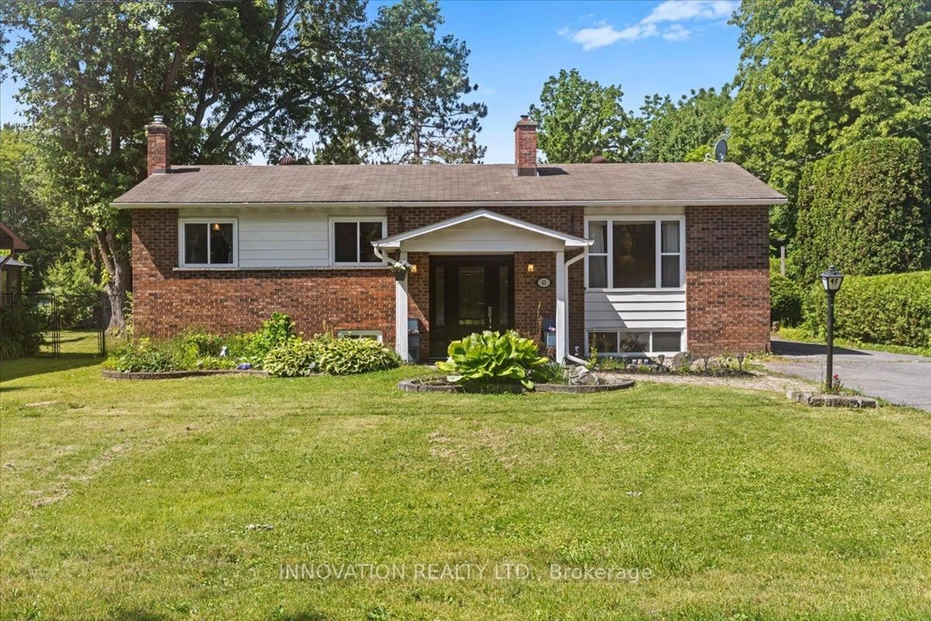 Home with brick exterior material, street for 41 King Street Dr, Richmond Ontario K0A 2Z0