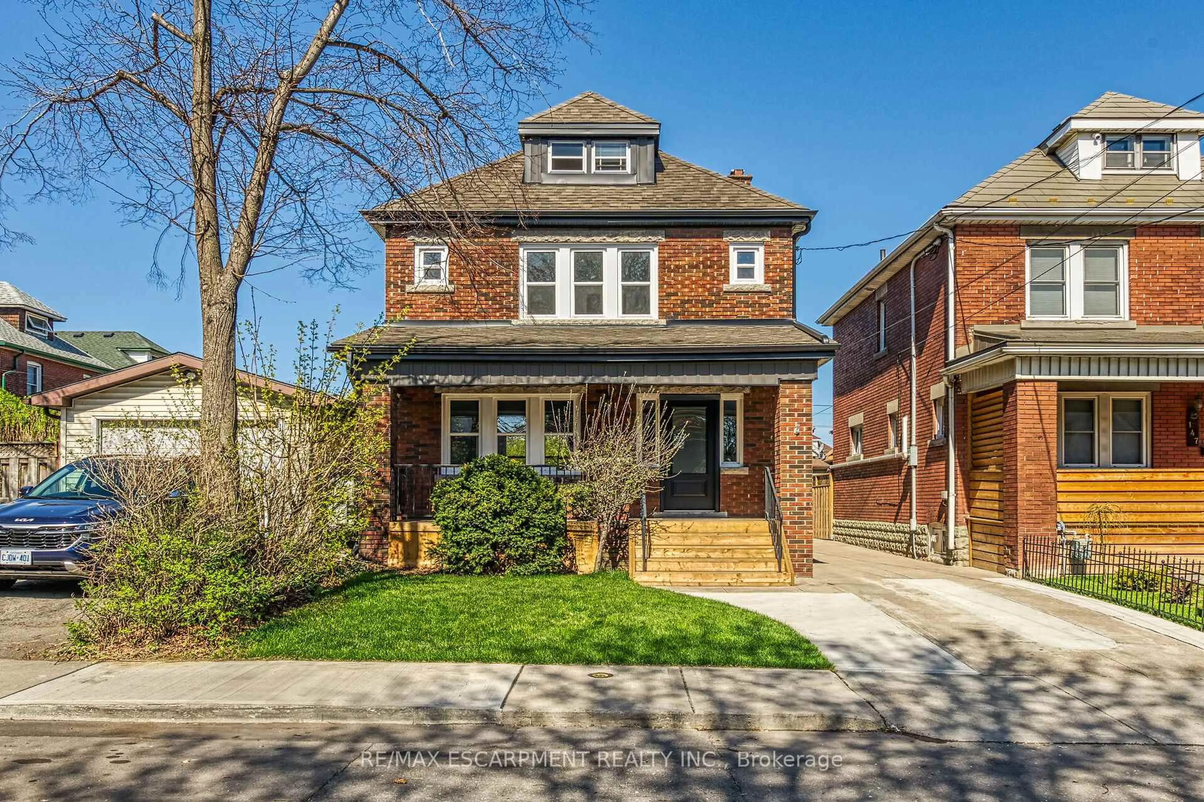 Home with brick exterior material, street for 145 Prospect St, Hamilton Ontario L8L 6X8