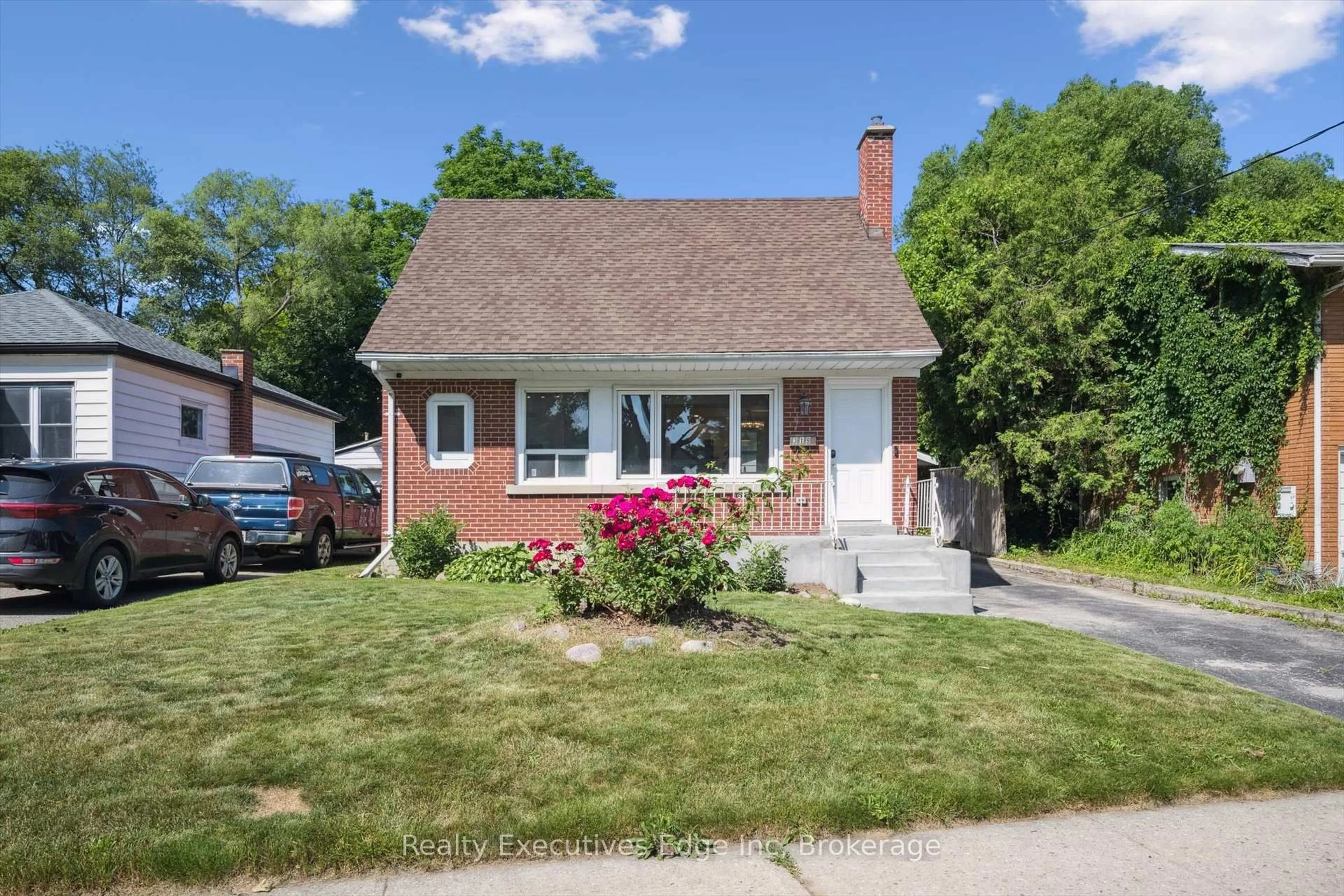 Home with brick exterior material, street for 319 Clifton Rd, Kitchener Ontario N2H 4W1