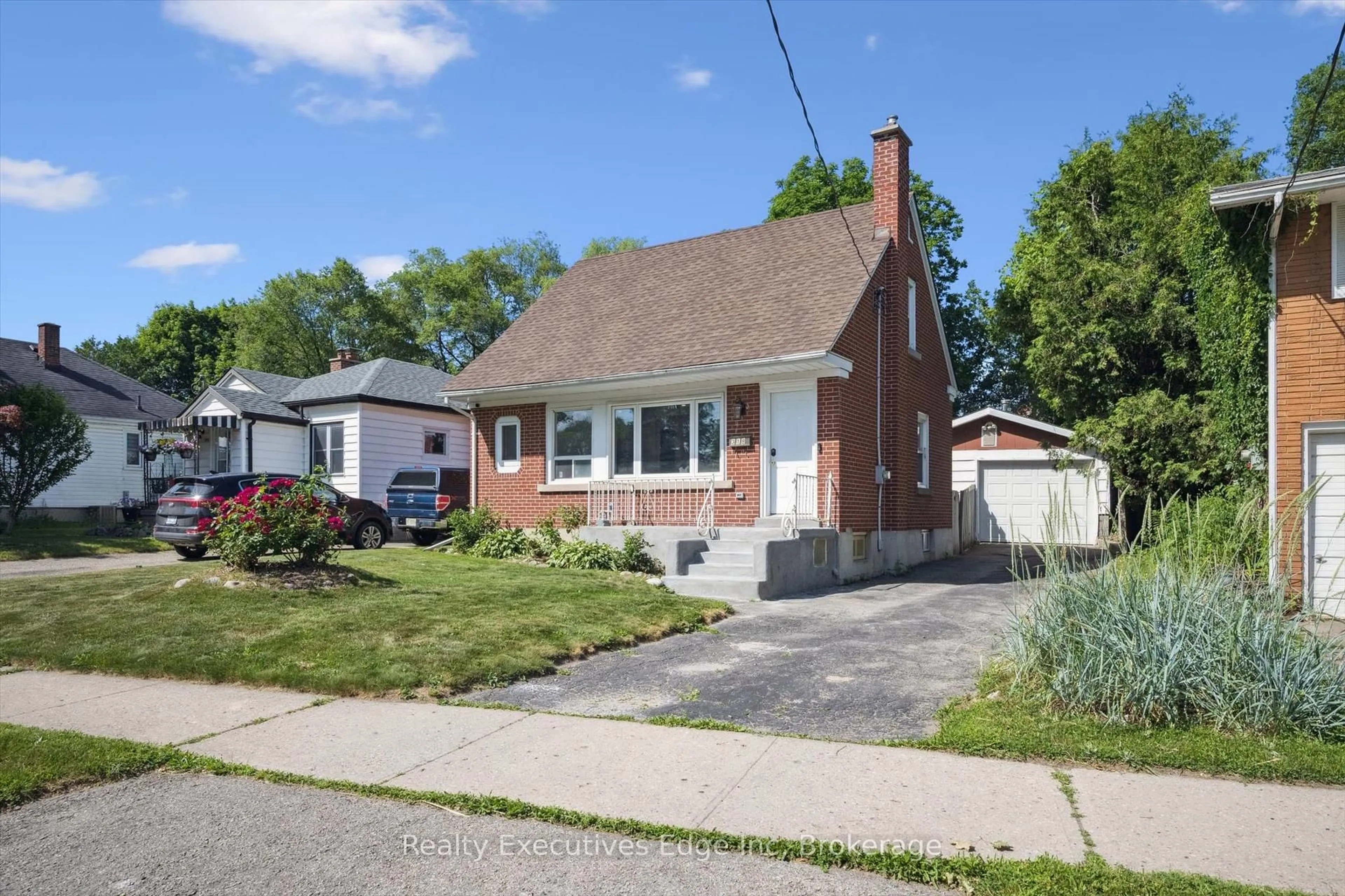 Home with brick exterior material, street for 319 Clifton Rd, Kitchener Ontario N2H 4W1