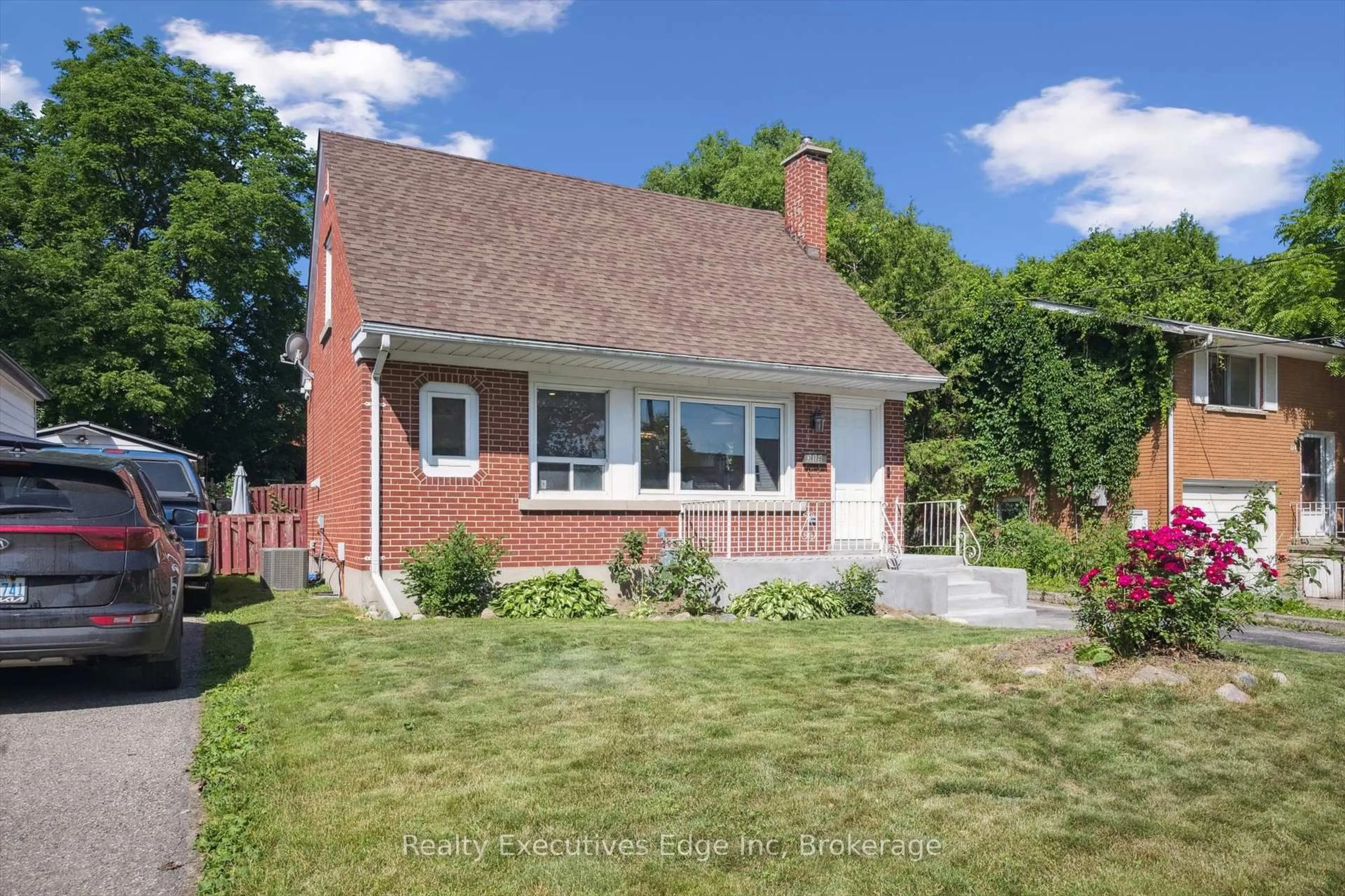 Home with brick exterior material, street for 319 Clifton Rd, Kitchener Ontario N2H 4W1