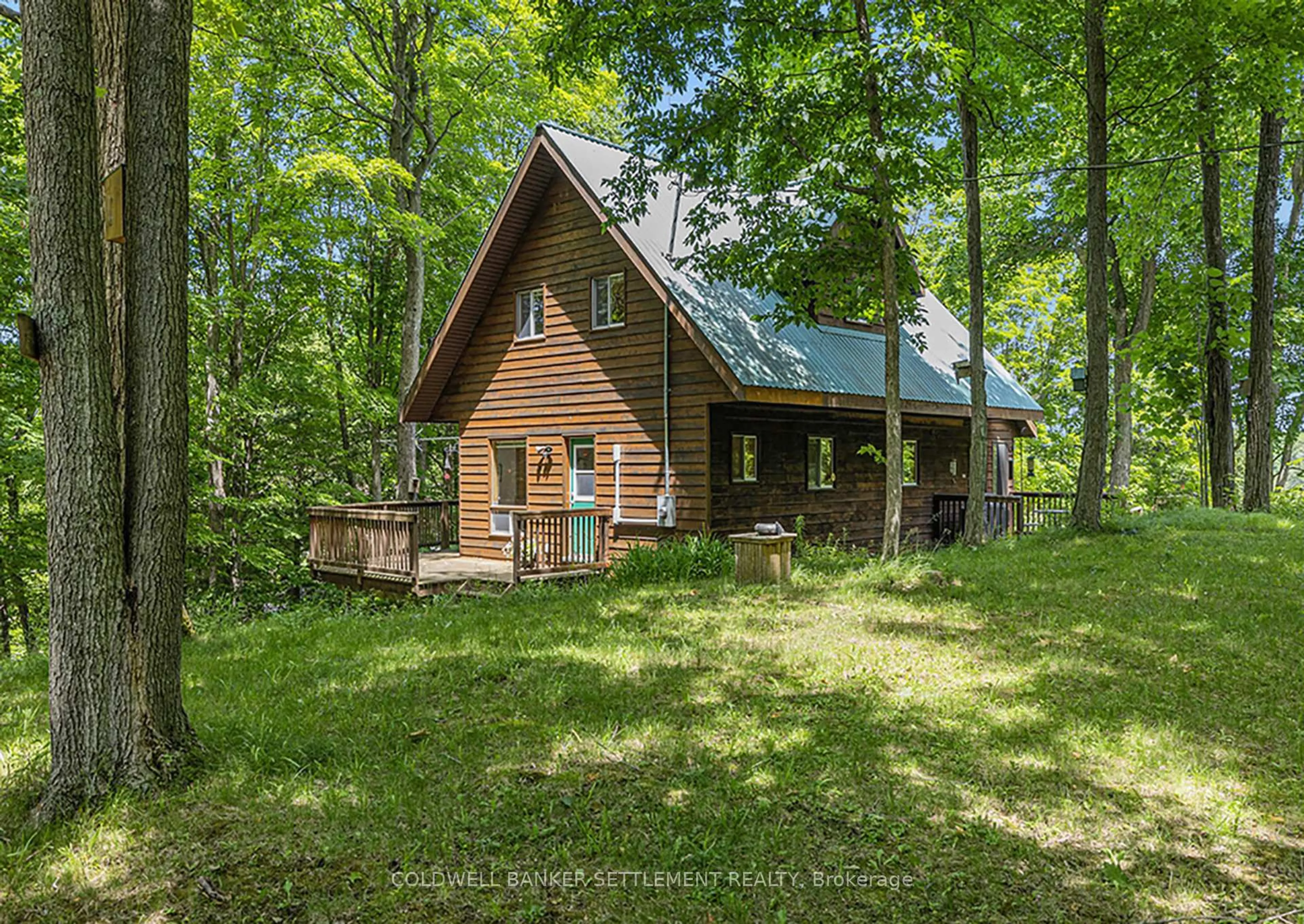 A pic from outside/outdoor area/front of a property/back of a property/a pic from drone, forest/trees view for 110 Horseshoe Bay Rd, Perth Ontario K7H 3C5