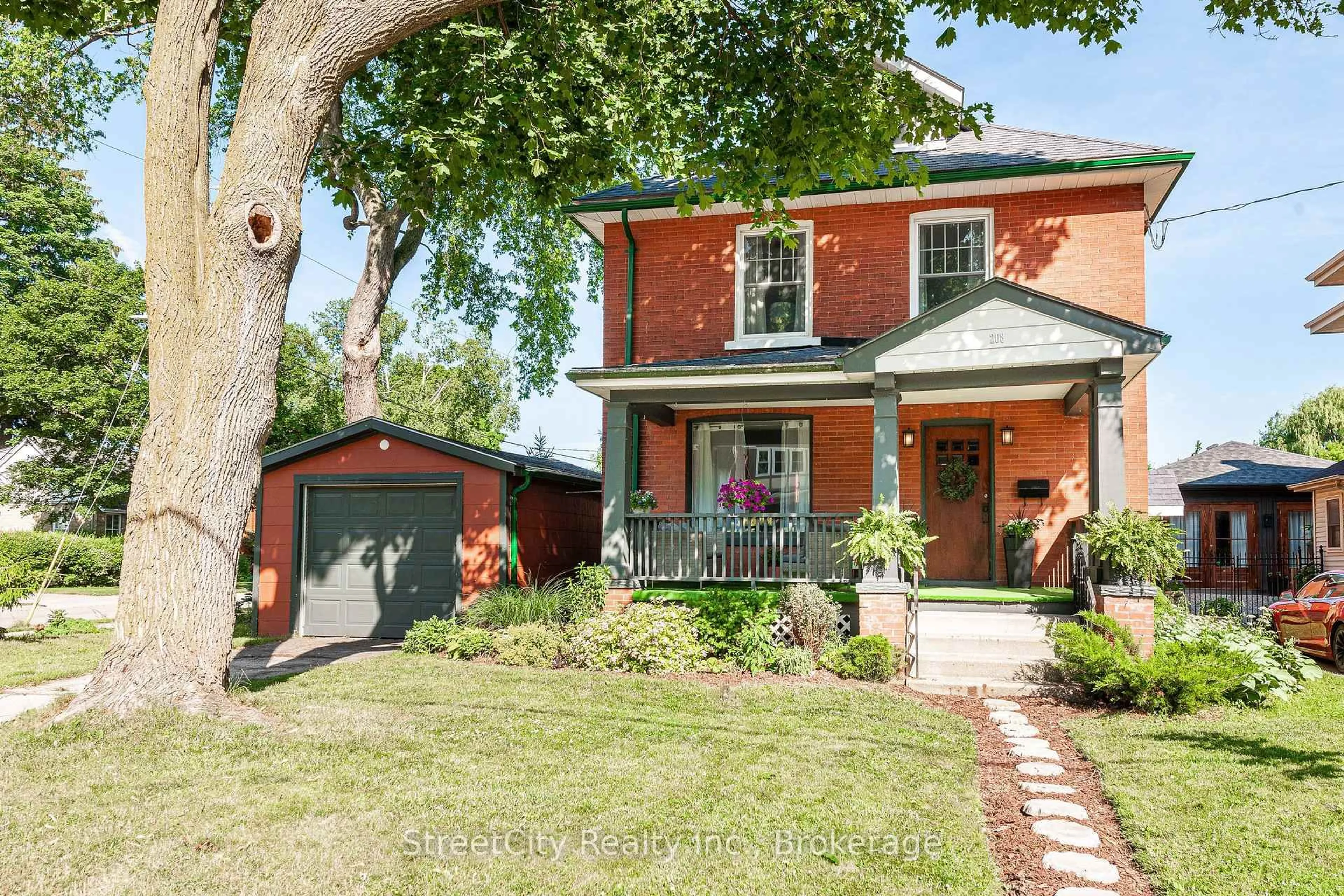 Home with brick exterior material, street for 208 Birmingham St, Stratford Ontario N5A 2T4
