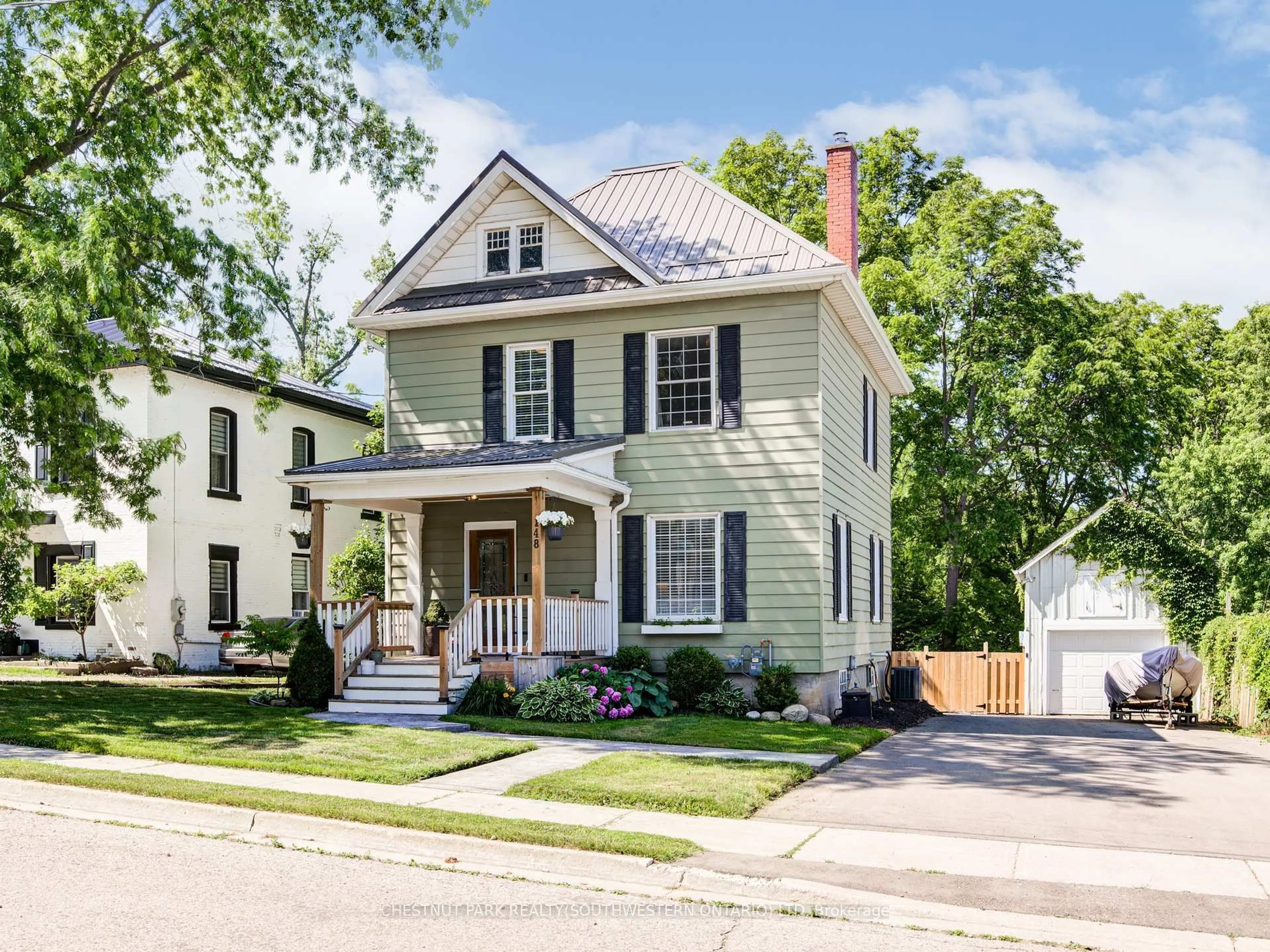 Home with vinyl exterior material, street for 148 Merritt St, Ingersoll Ontario N5C 3A3