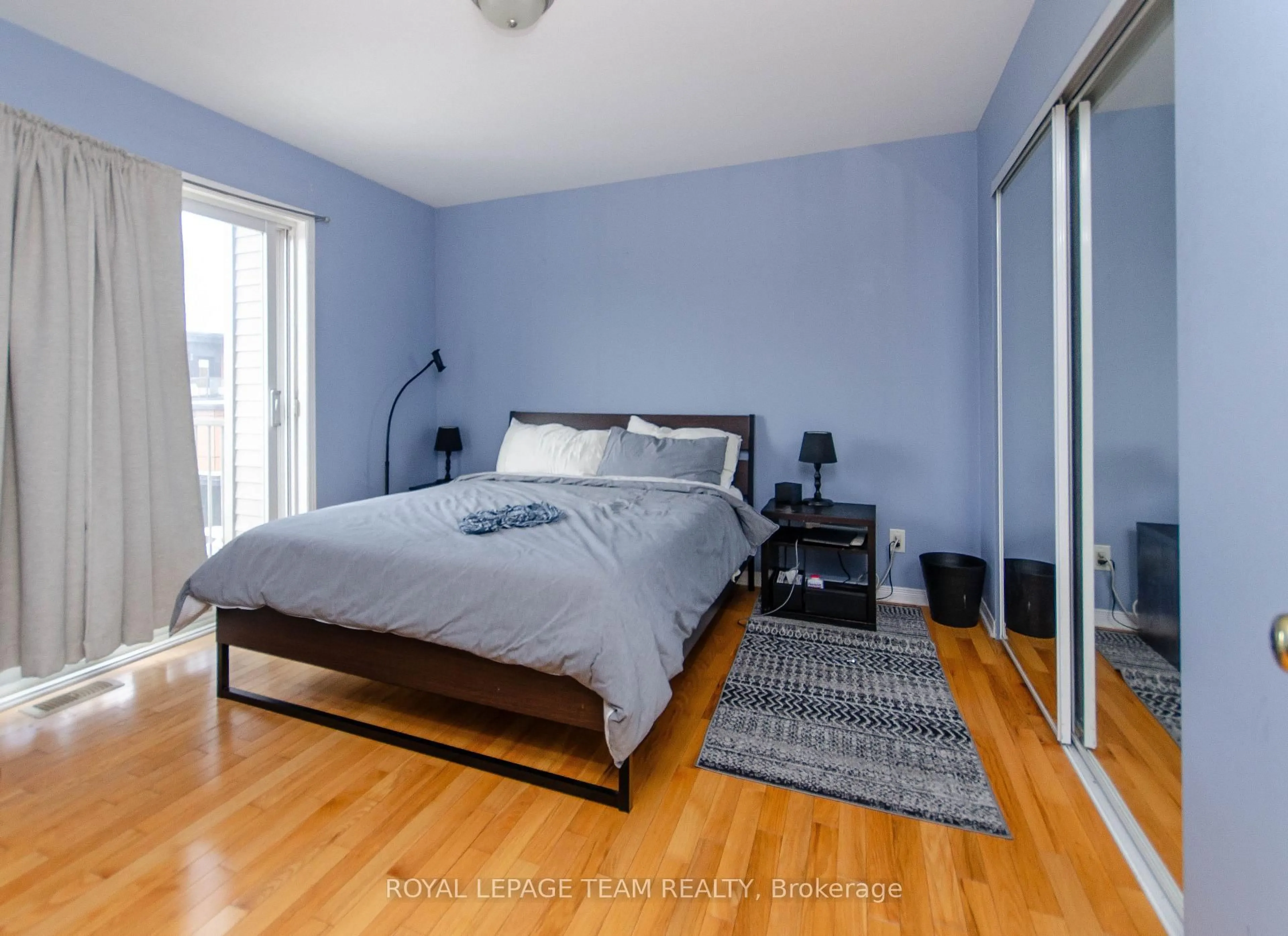 Bedroom with bed, wood/laminate floor for 258-260 St. Andrew St, Ottawa Ontario K1N 5G7