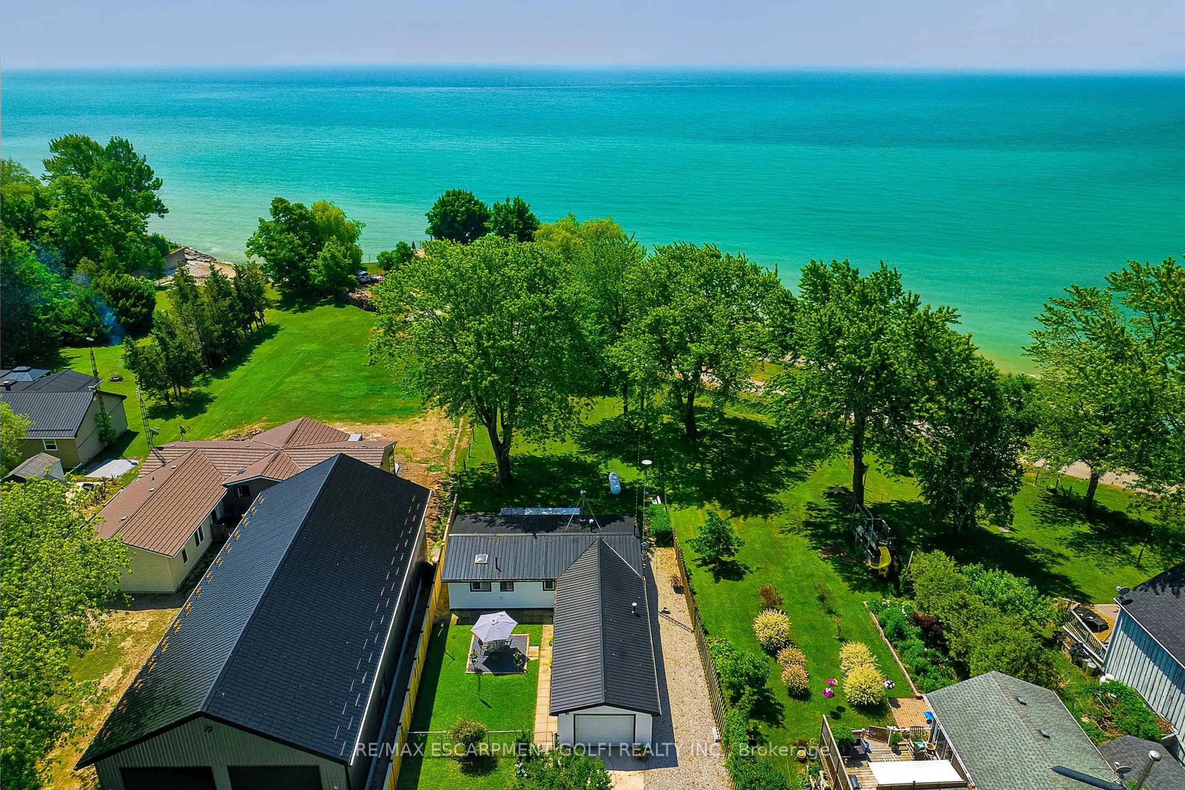 A pic from outside/outdoor area/front of a property/back of a property/a pic from drone, water/lake/river/ocean view for 3058 Lakeshore Rd, Haldimand Ontario N1A 2W8