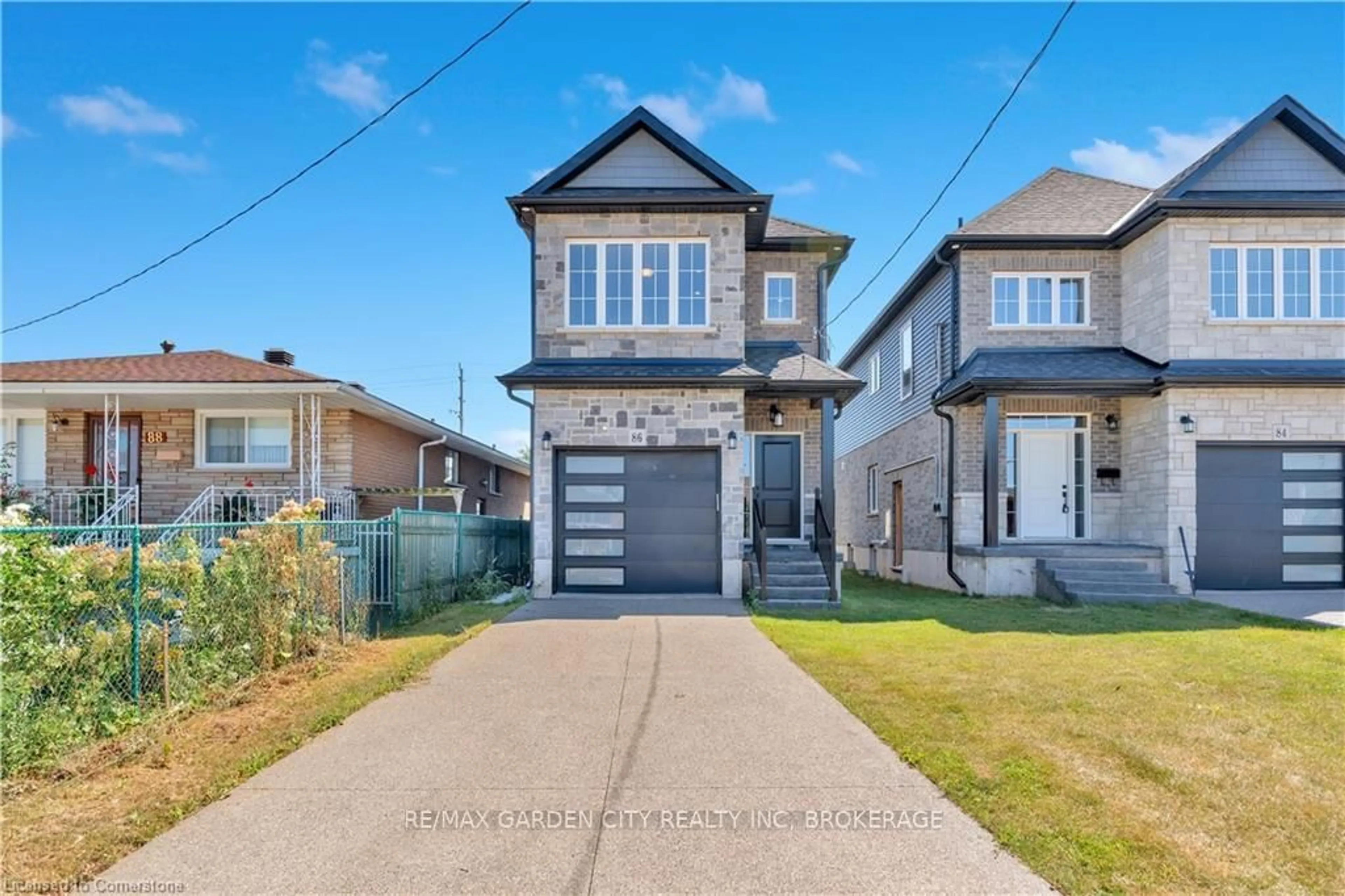 Home with brick exterior material, street for 86 Beland Ave, Hamilton Ontario L8H 6L1